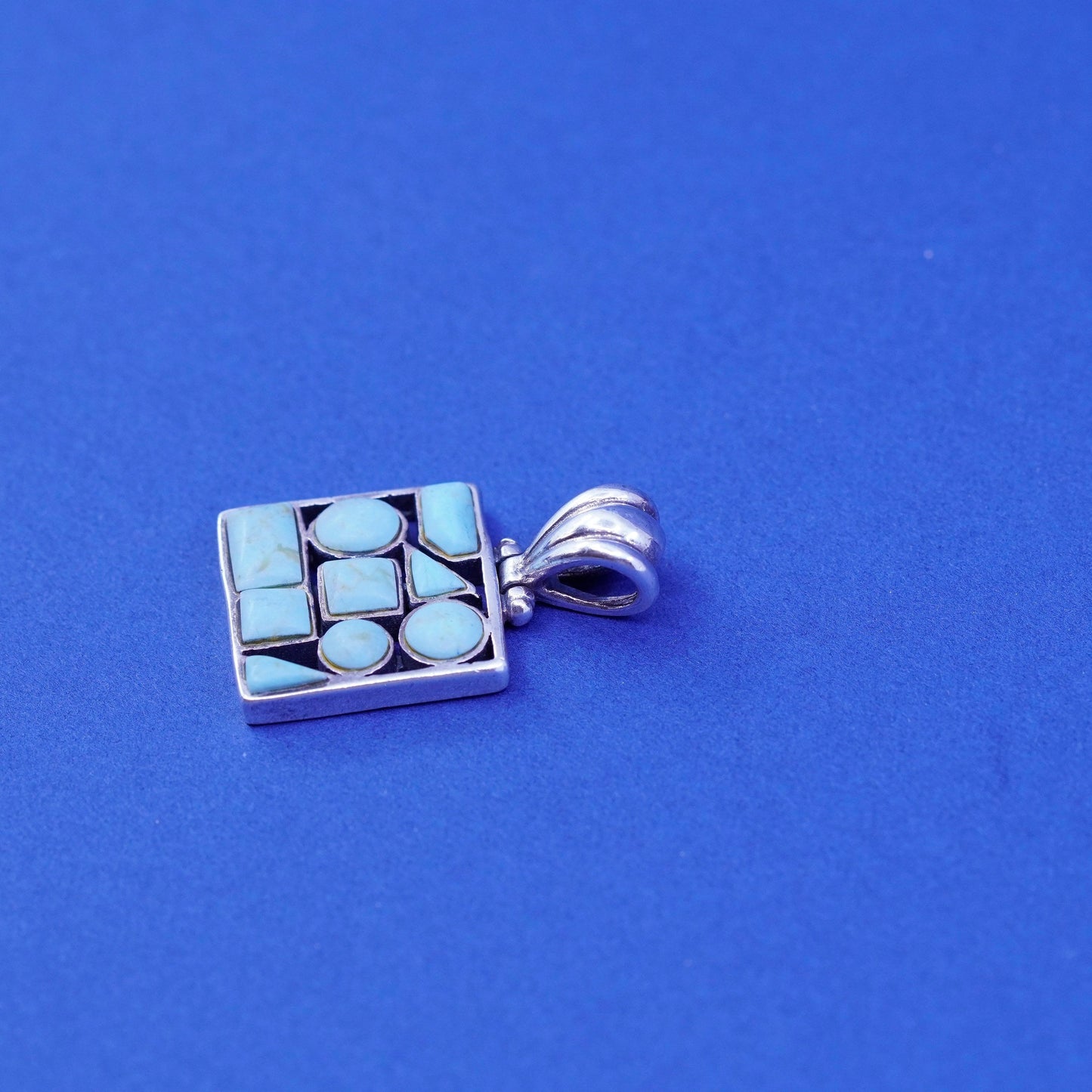 Vintage southwestern Sterling 925 silver handmade pendant with turquoise