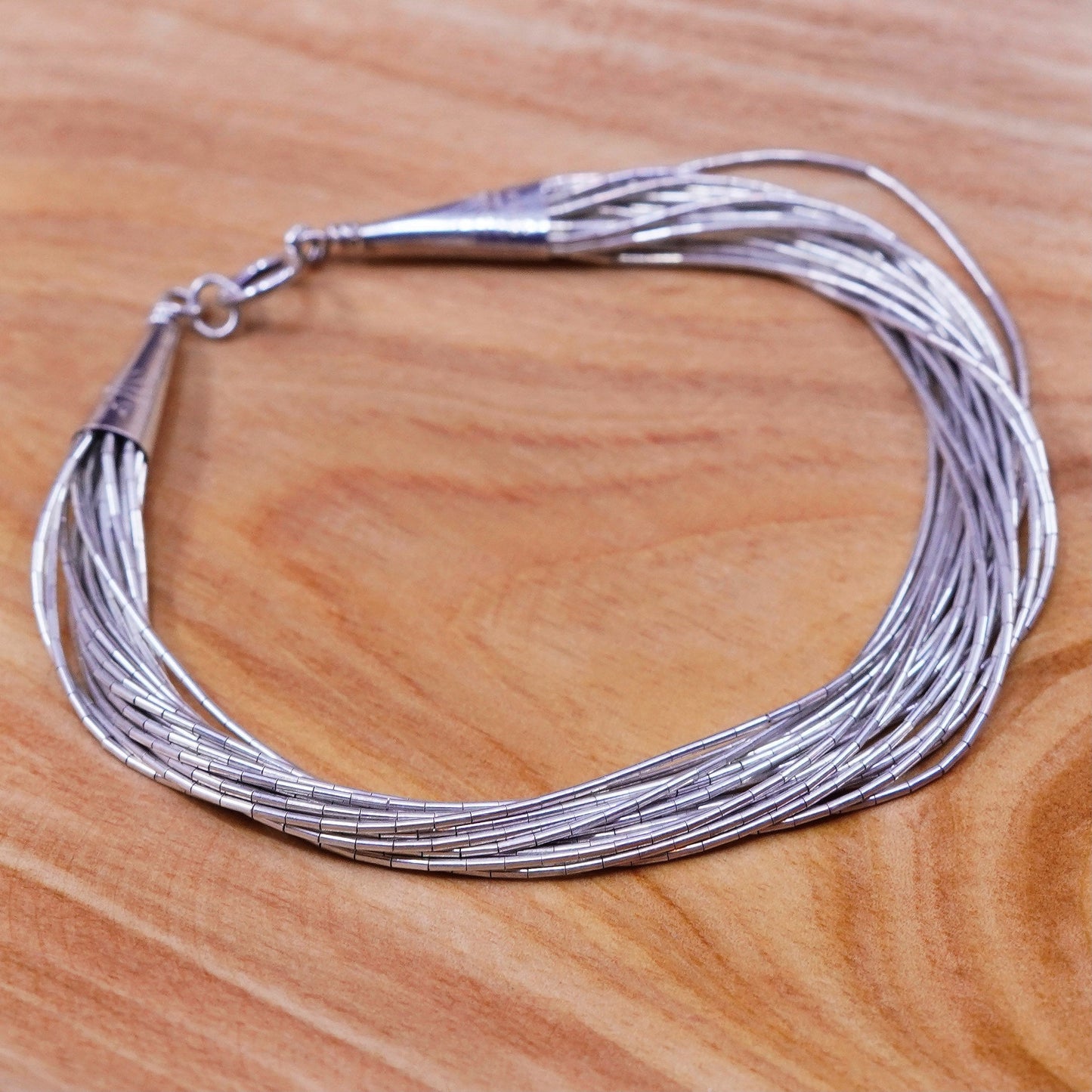 6.75”, vtg Sterling 925 handmade bracelet, 20 multi strands liquid Silver chain
