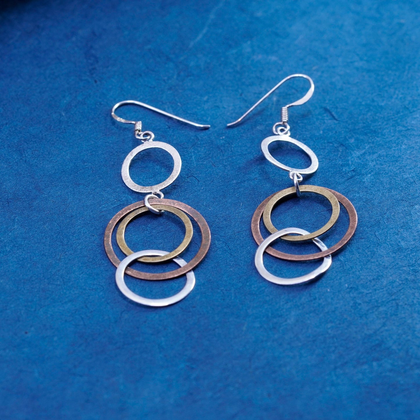 Vintage Sterling Silver handmade Earrings. 925 entwined flatten circle dangles