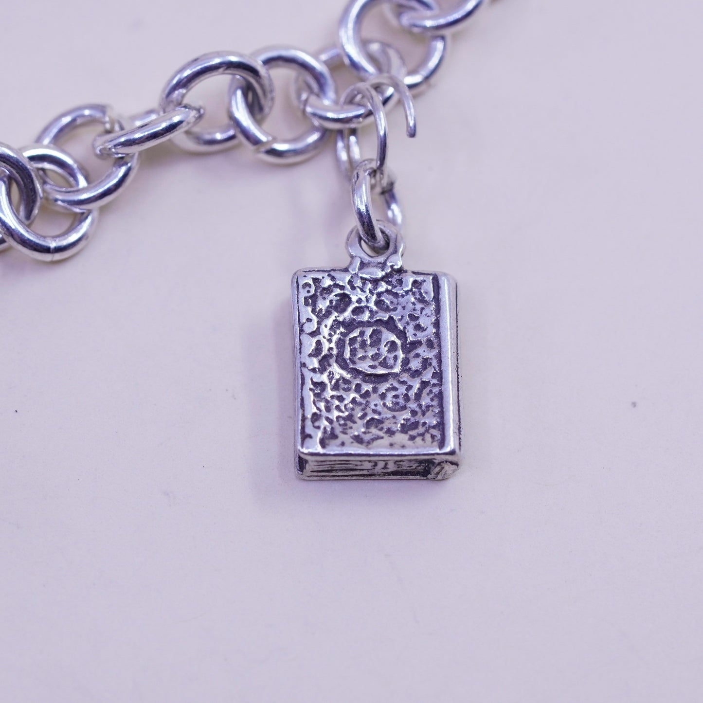 6.75” sterling silver bracelet, bold circle chain heart bible cross piano