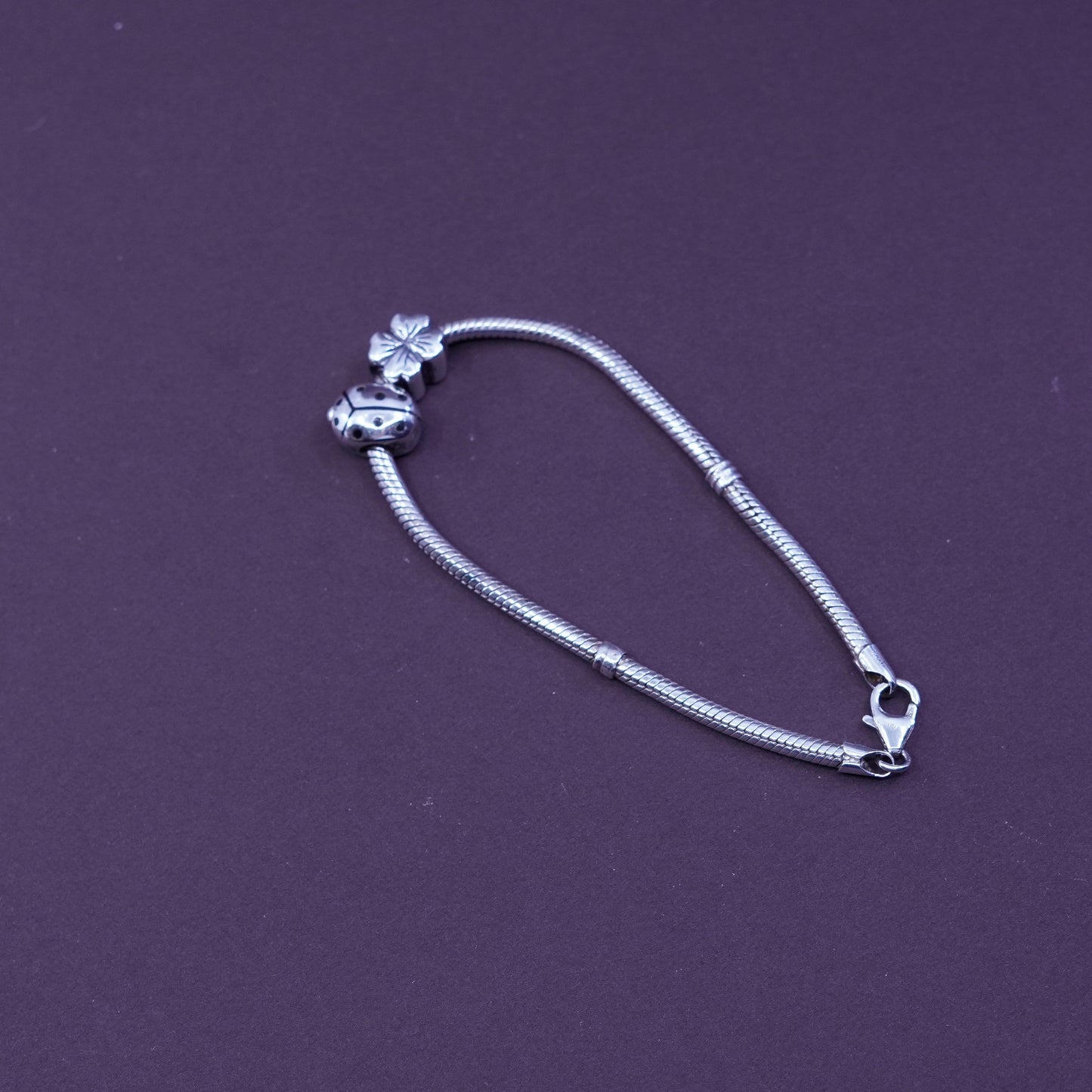 7.25”, Sterling silver snake chain, 925 bracelet w/ lady bug and flower charms