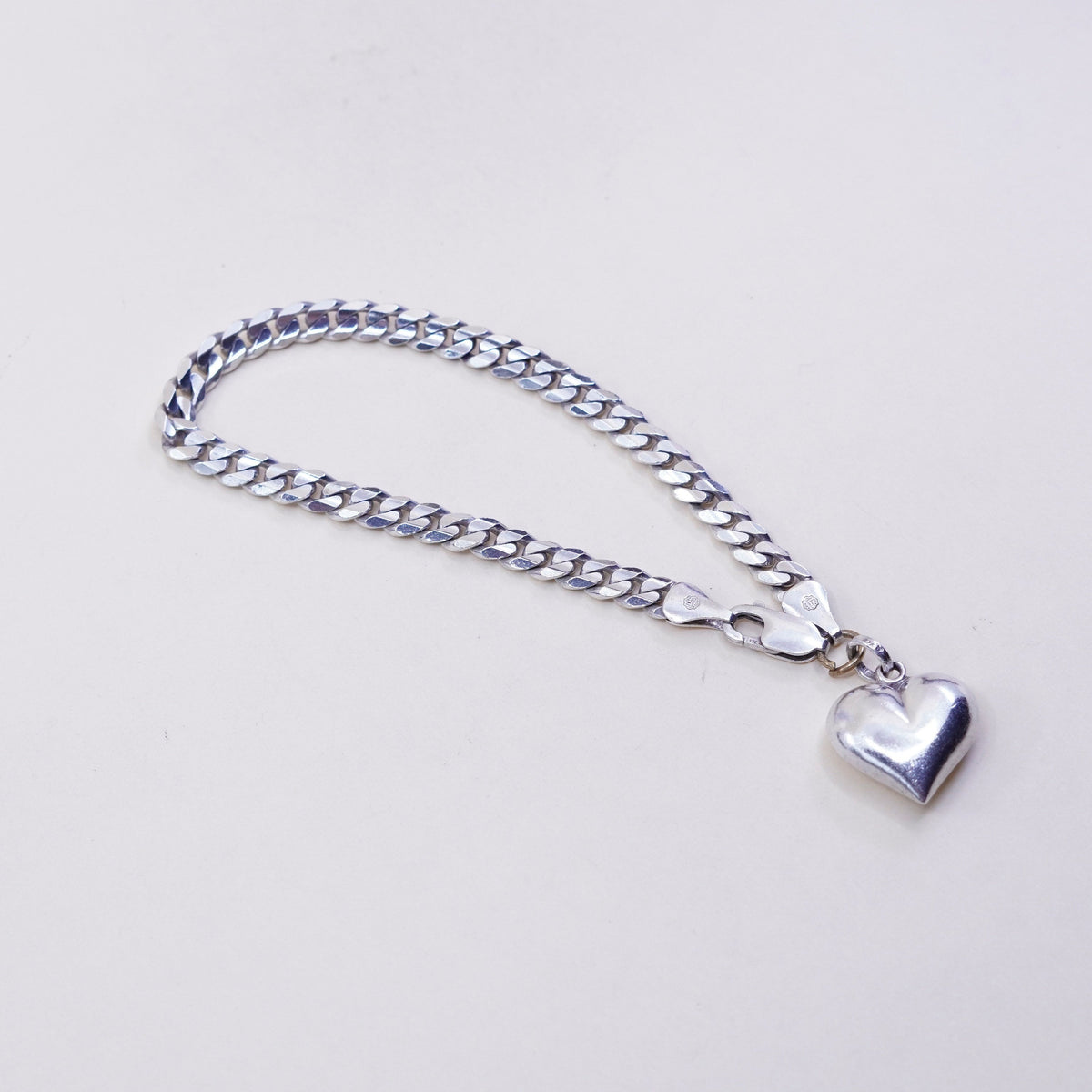 7.75”, sterling silver flatten curb bracelet, bold 925 chain with heart charm