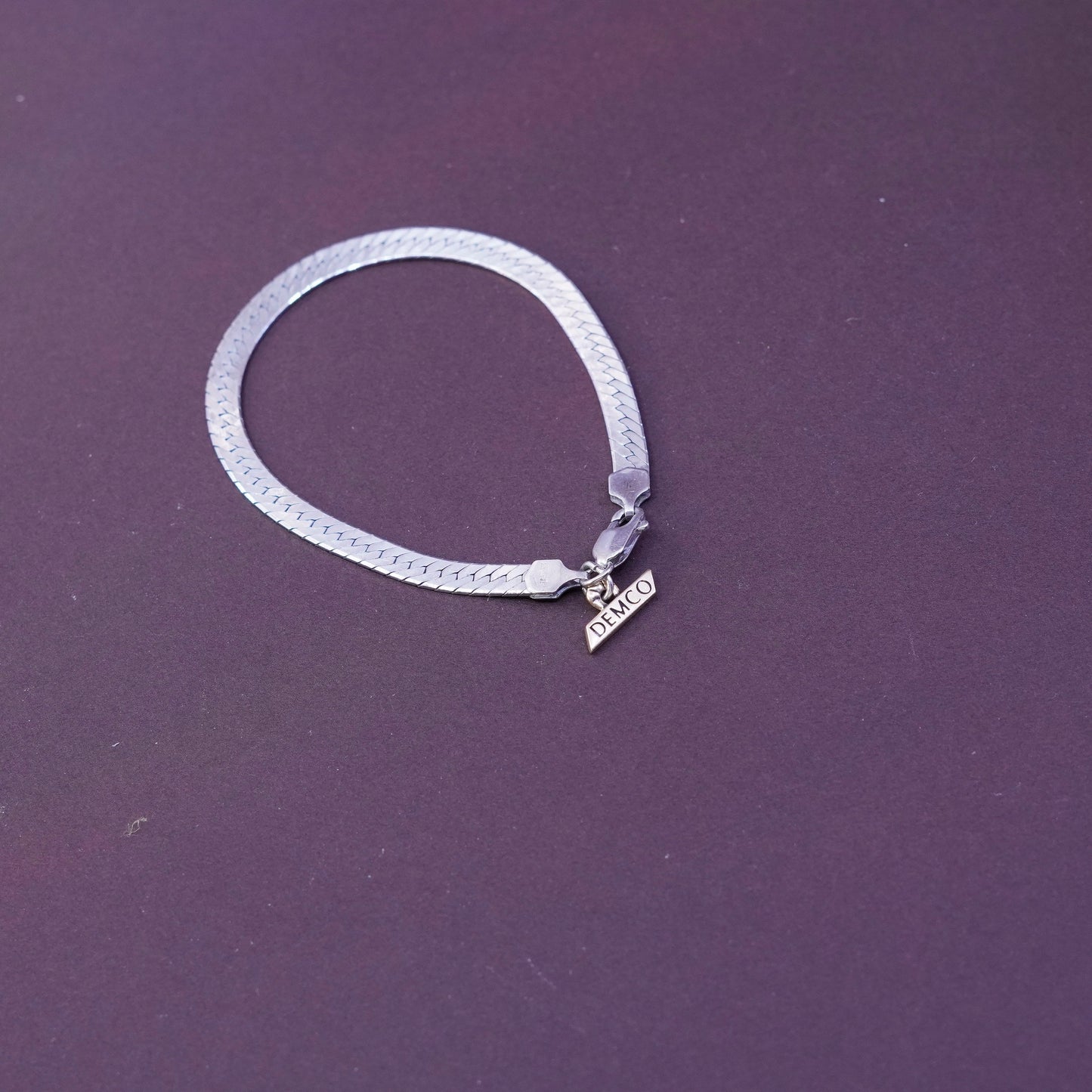7”, Sterling silver herringbone bracelet, Italy 925 chain 10K gold Demco charm