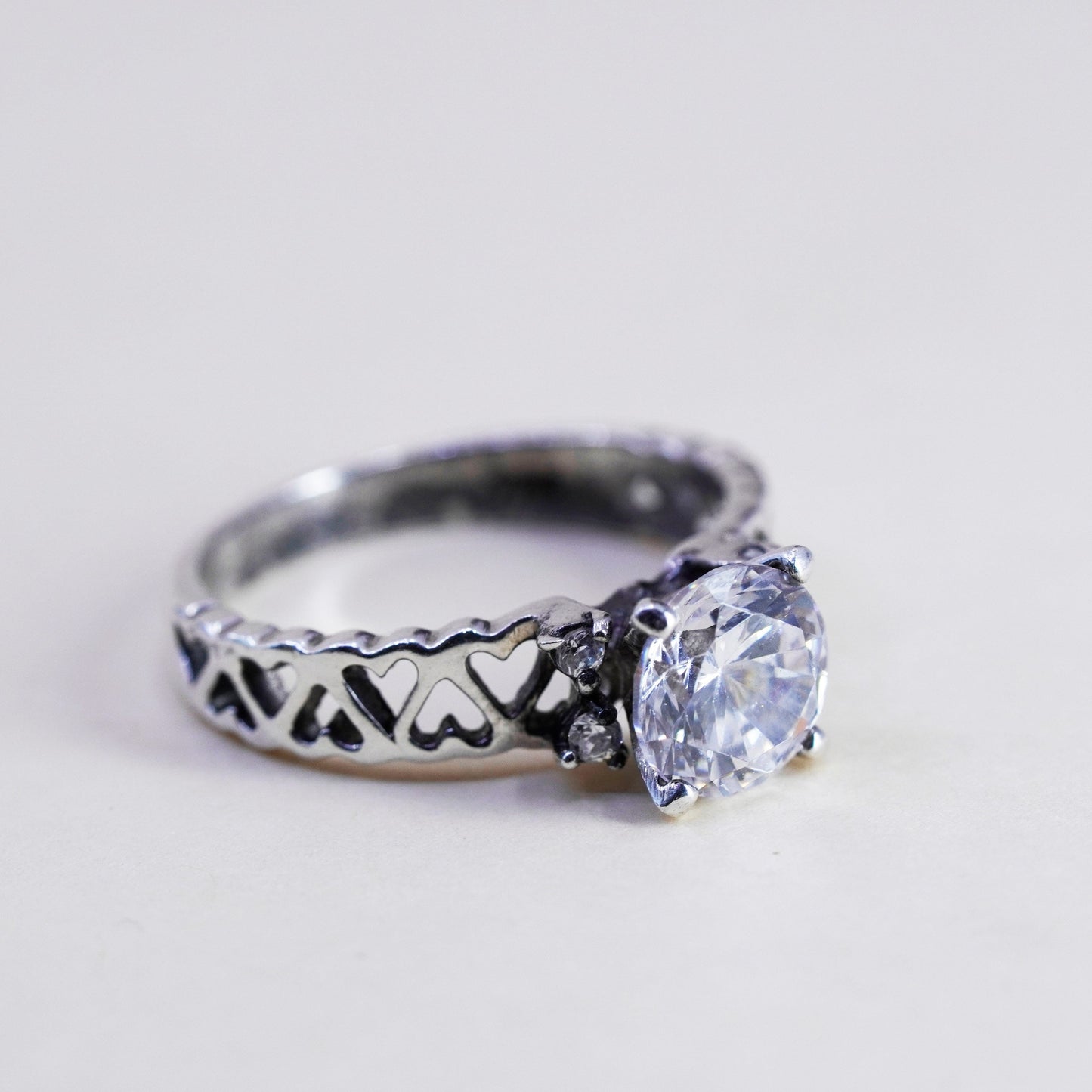 Size 5.25, vintage Sterling 925 silver Statement ring w/ Cz and heart around