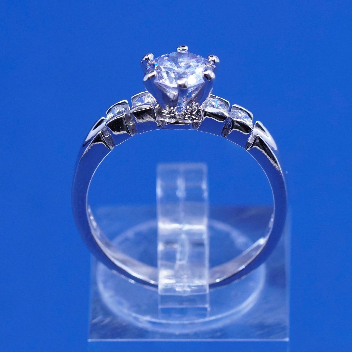 Size 7.25, vintage Sterling 925 silver engagement ring with clear cz stones
