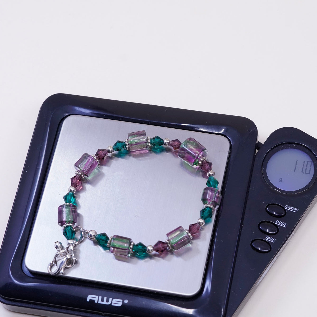 7.5”, vtg Sterling silver handmade bracelet, 925 beads w/ purple green crystal