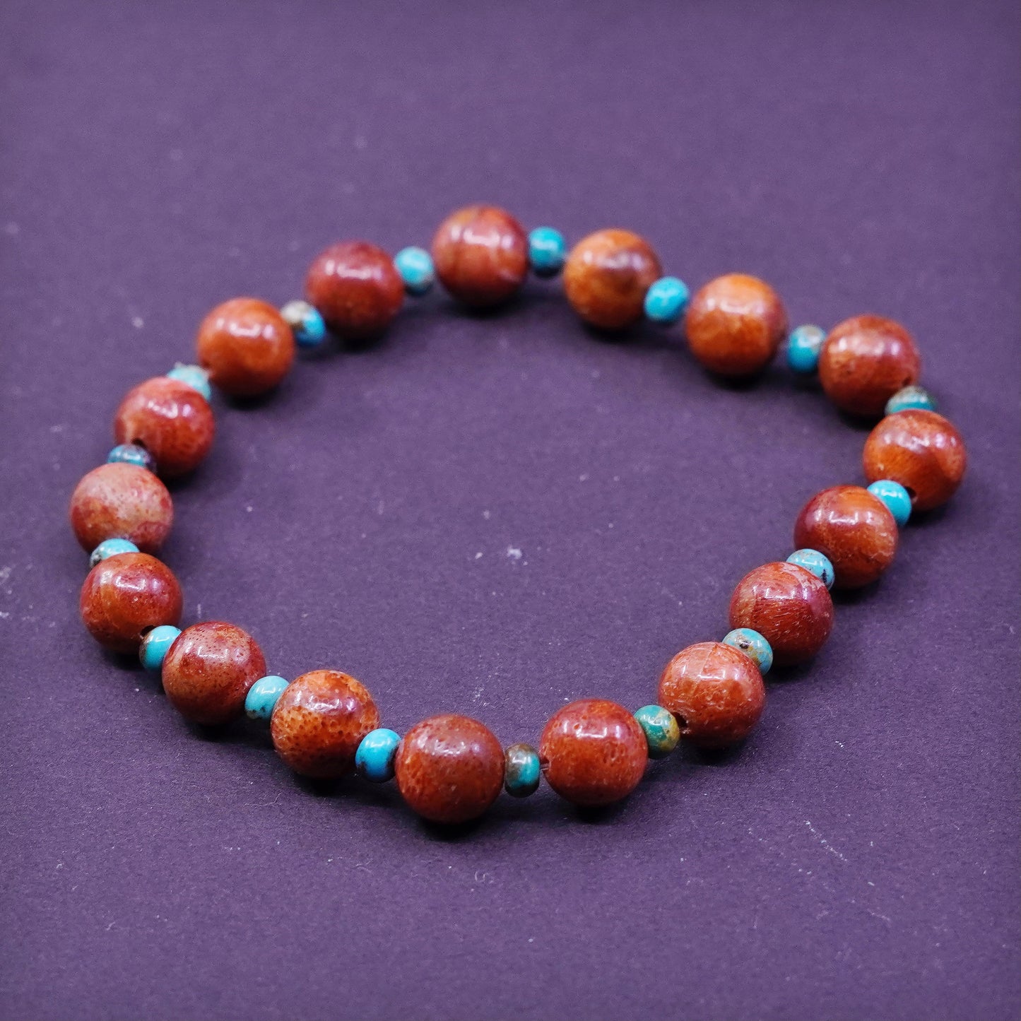 6.75”, vtg handmade bracelet, elastic band with red coral and turquoise beads