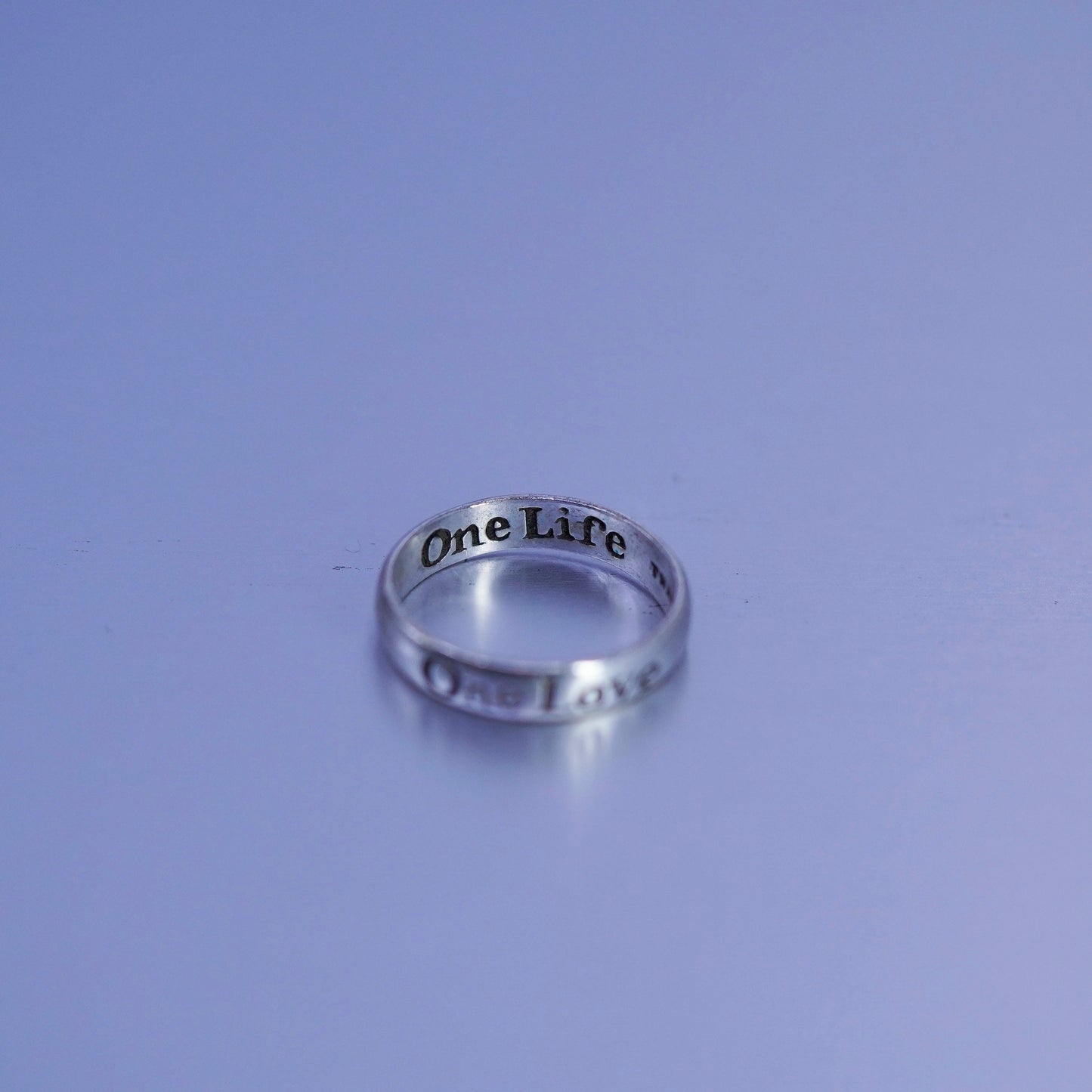 Size 7, southwestern Sterling 925 silver wedding ring, band “one love one life