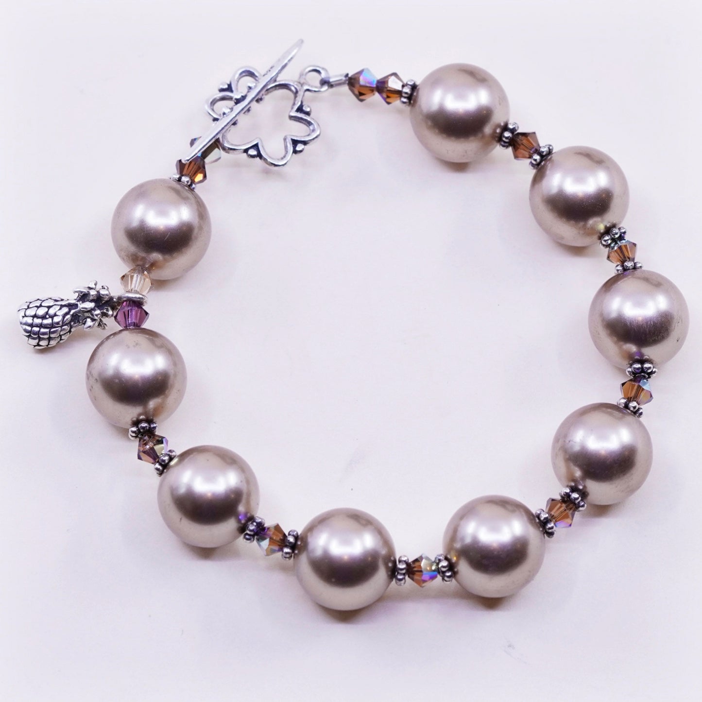 6.5”, handmade bracelet, faux pearl with 925 silver clasp and pineapple charm