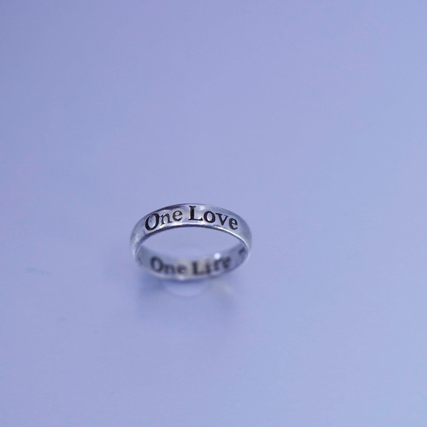 Size 7, southwestern Sterling 925 silver wedding ring, band “one love one life