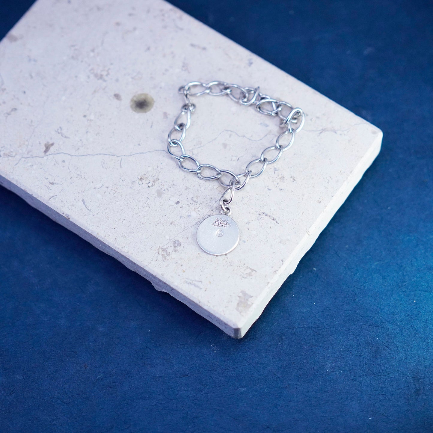 7.25”, Sterling silver bracelet, Mexico 925 oval chain w/ Mayan calendar charm