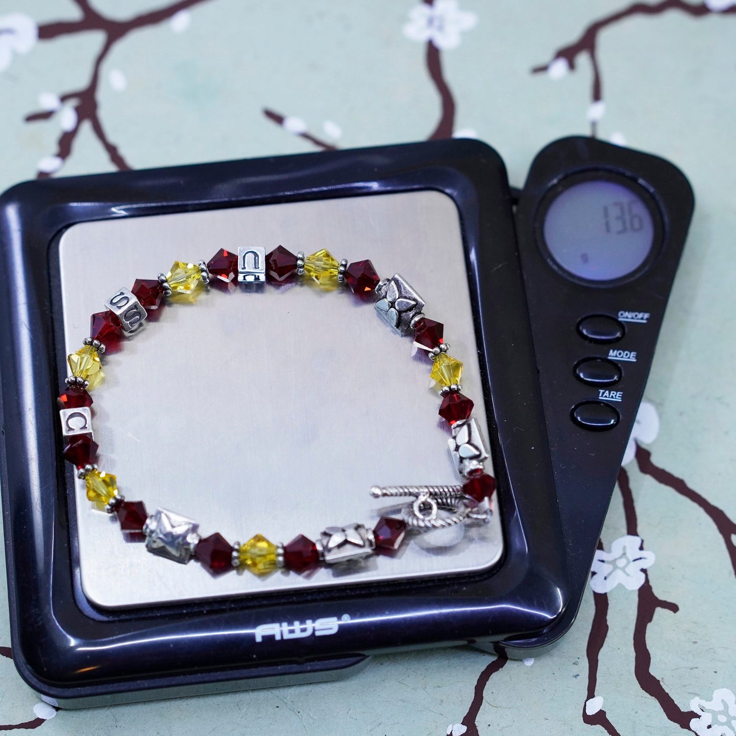 7”, vintage 925 sterling silver bracelet with red yellow crystal and USC cubes