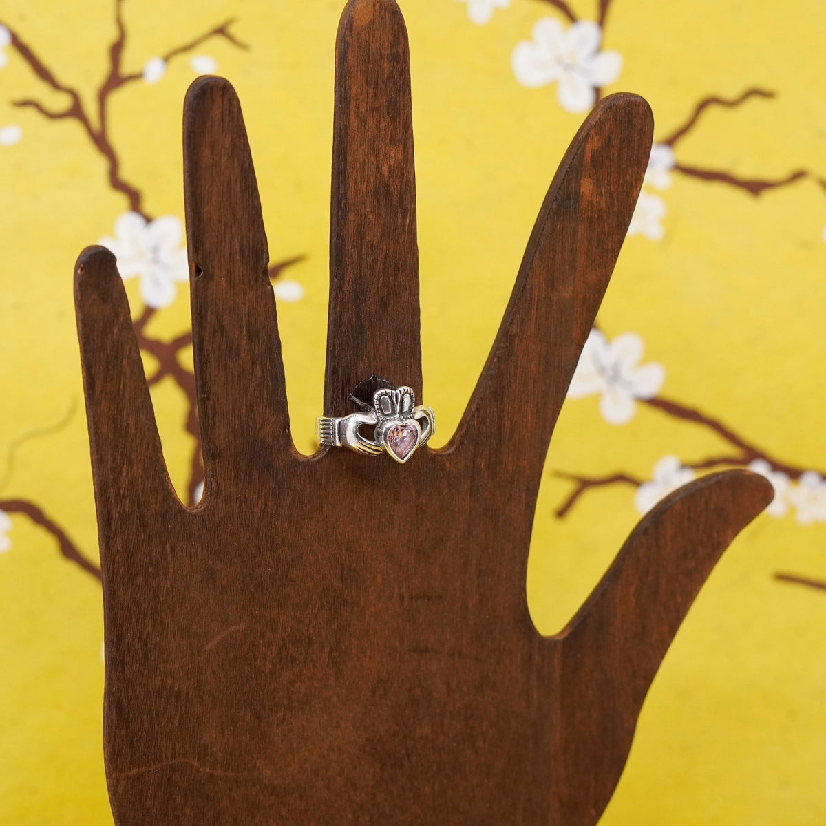 Size 7, Vintage sterling 925 silver claddagh ring, holding pink Cz heart band