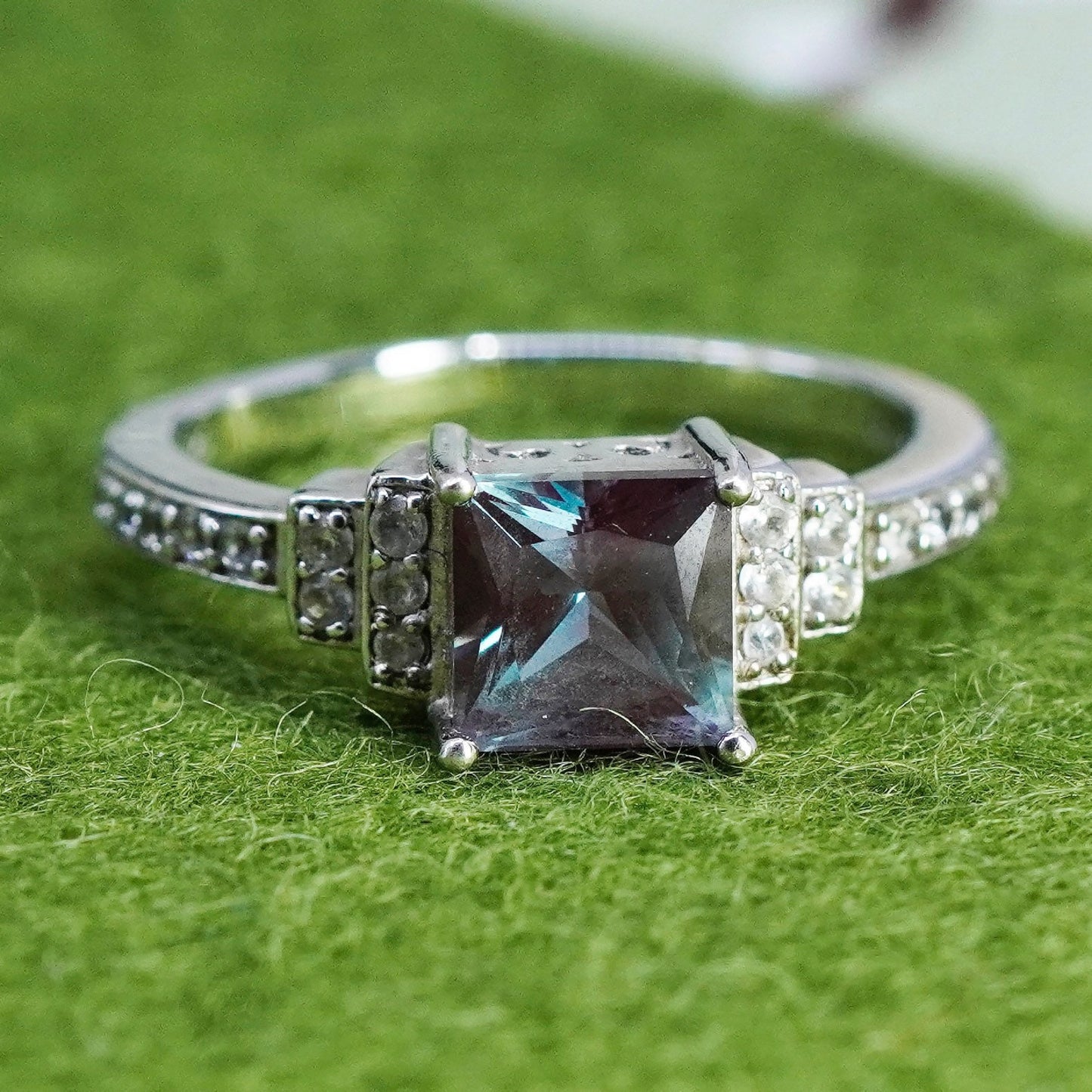 Size 9.25, vintage 925 Sterling silver ring with topaz and cz around