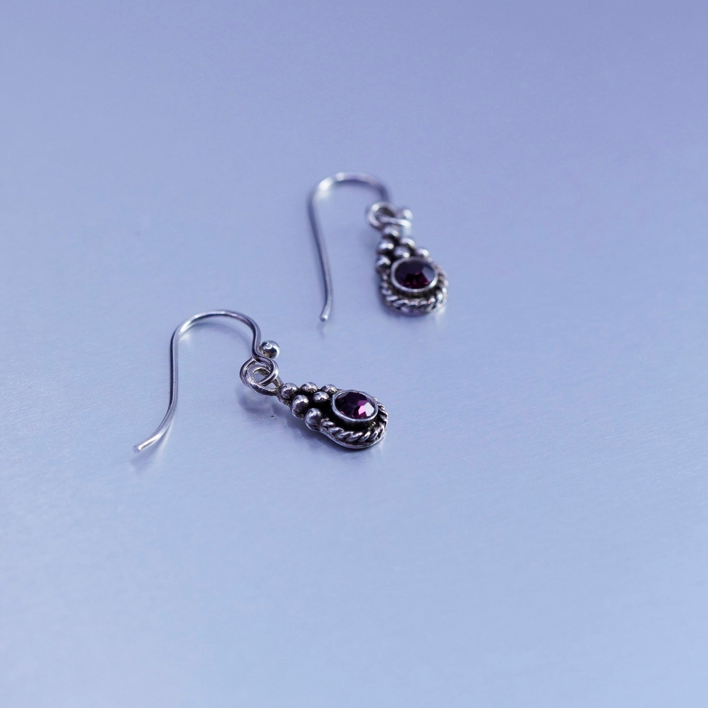Vintage Sterling 925 silver earrings with purple crystal and cable around