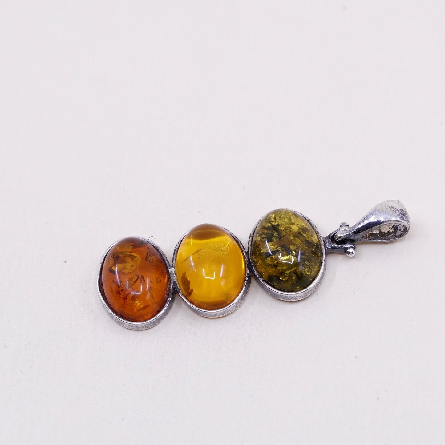 Vintage sterling 925 silver handmade pendant with oval amber