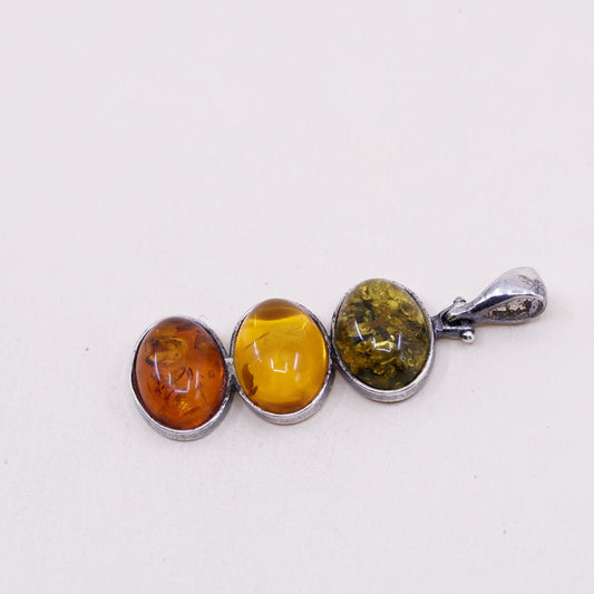 Vintage sterling 925 silver handmade pendant with oval amber