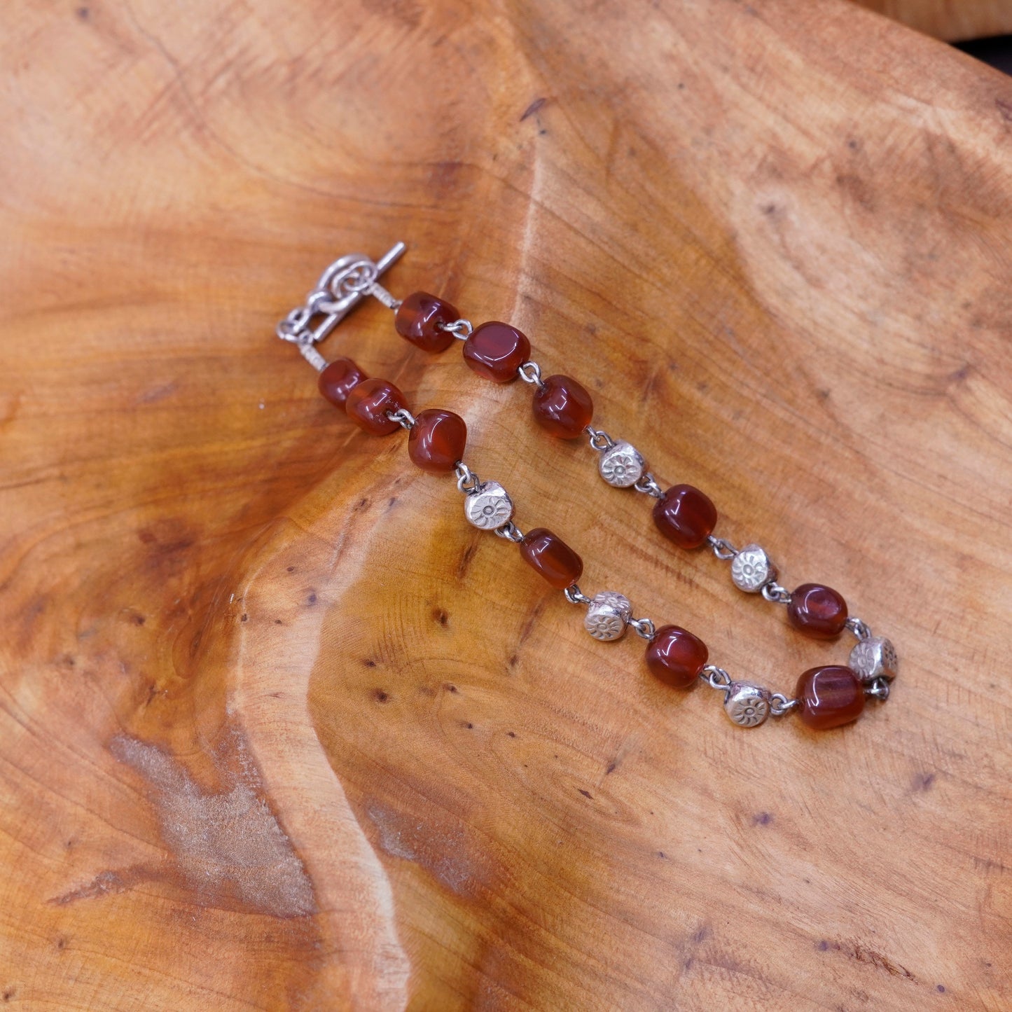 7.75”, vtg Sterling silver handmade garnet beads bracelet with toggle closure