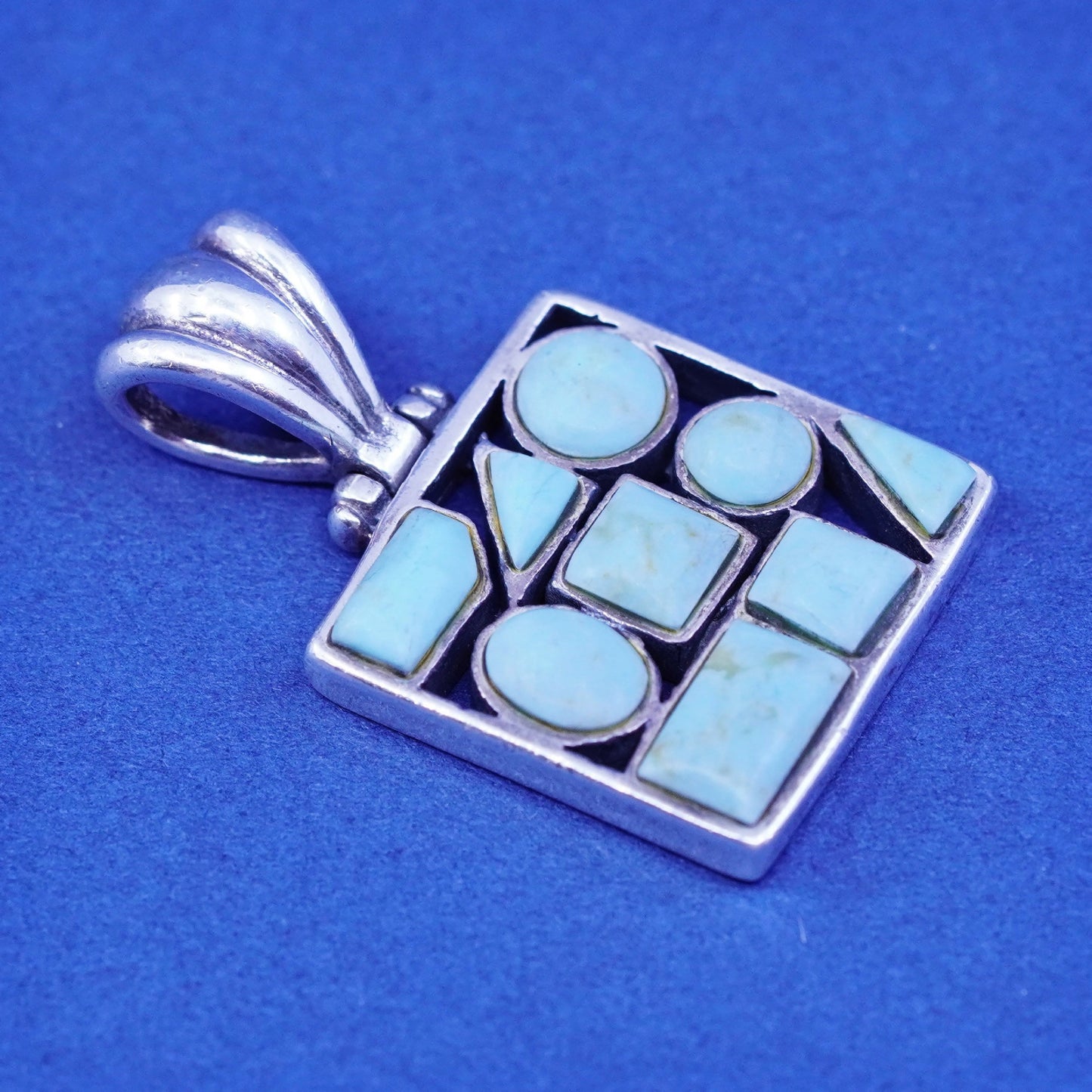 Vintage southwestern Sterling 925 silver handmade pendant with turquoise