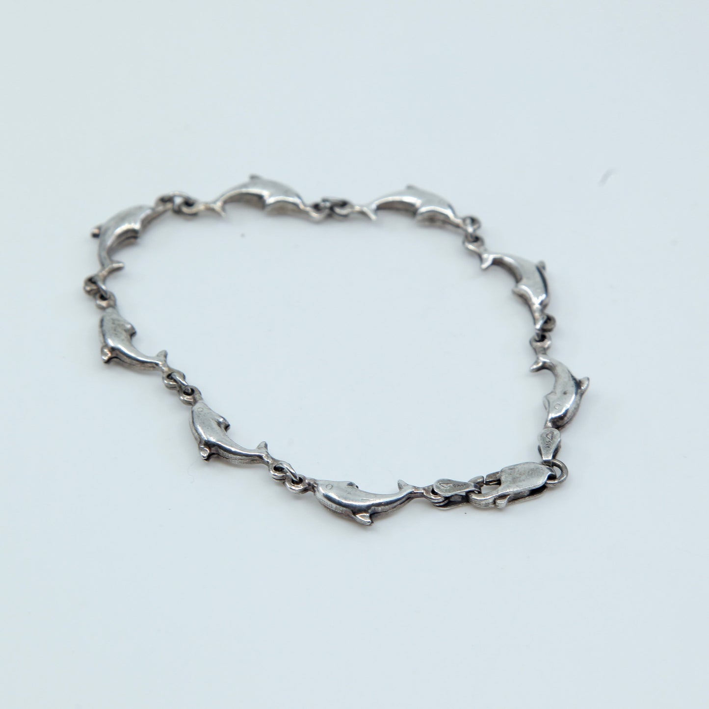7.", VTG Sterling silver handmade bracelet, solid 925 silver dolphin links
