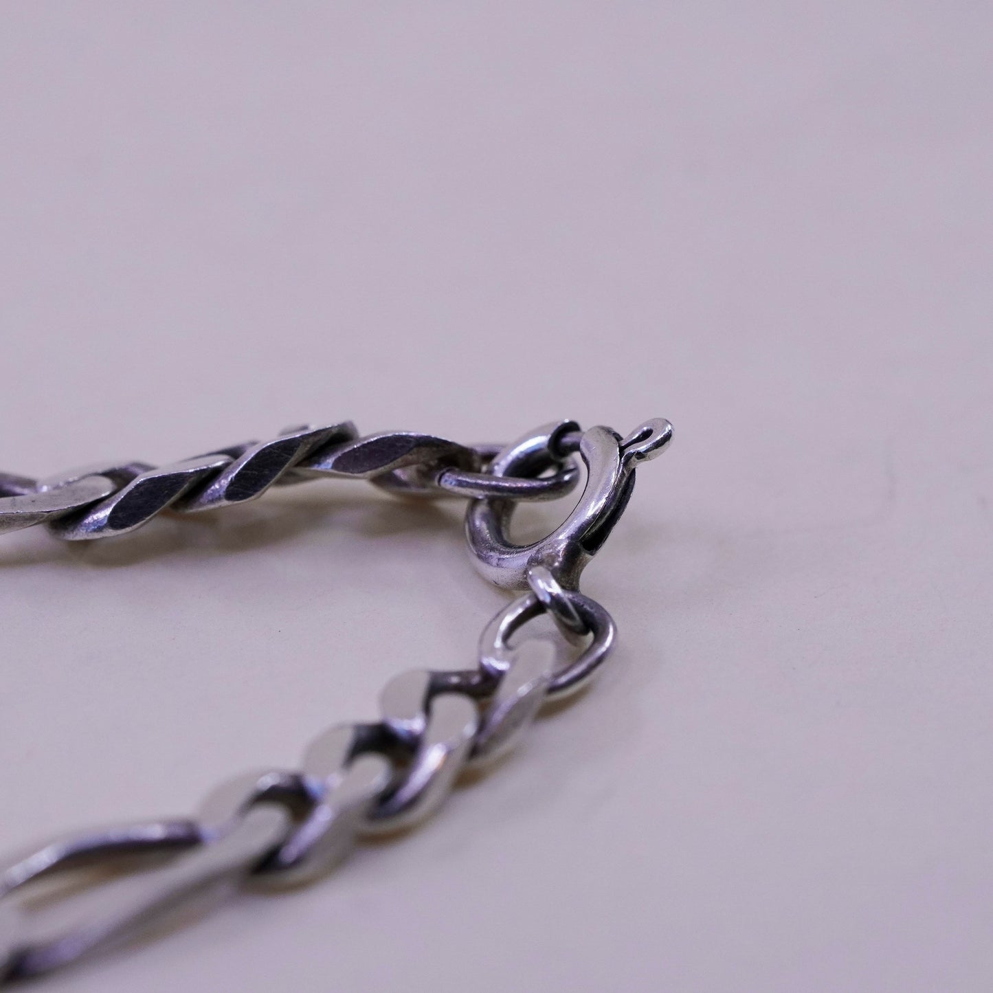 8” Sterling silver bracelet, 925 figaro chain name tag engraved “Elaine”