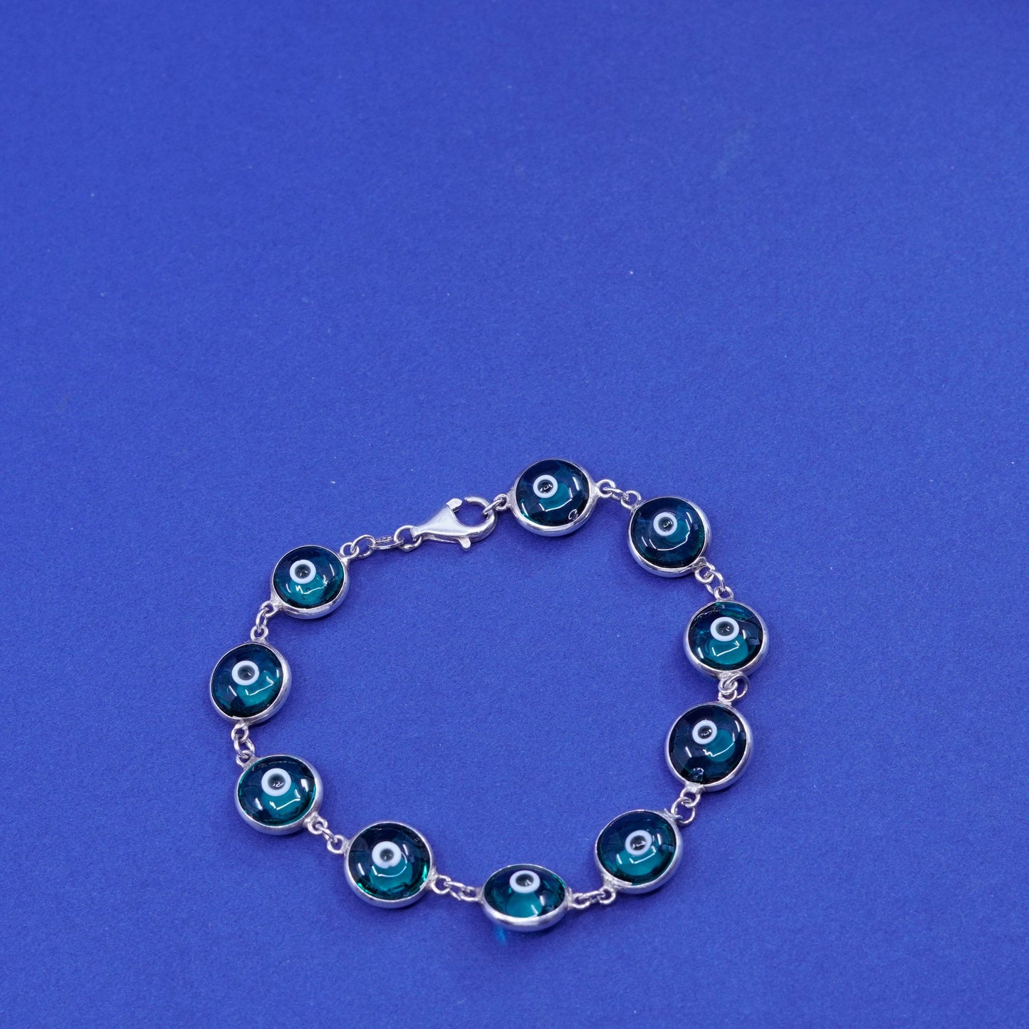6.75”, Vintage handmade sterling 925 silver bracelet, blue glass evil eye beads