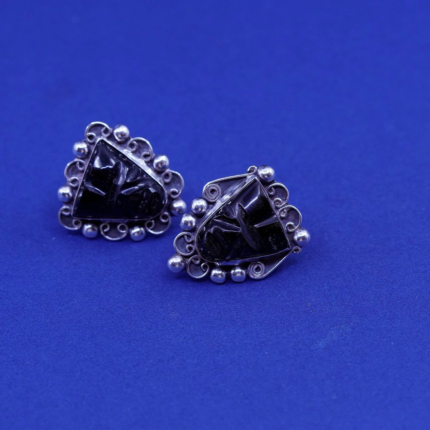 vtg Mexico Sterling silver handmade earrings, 925 screw back warrior face onyx