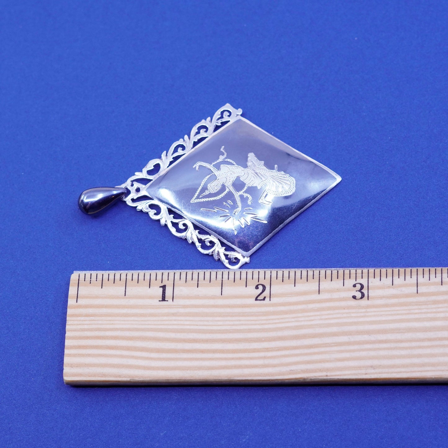 vtg Sterling 925 silver handmade diamond shaped pendant with goddess pattern