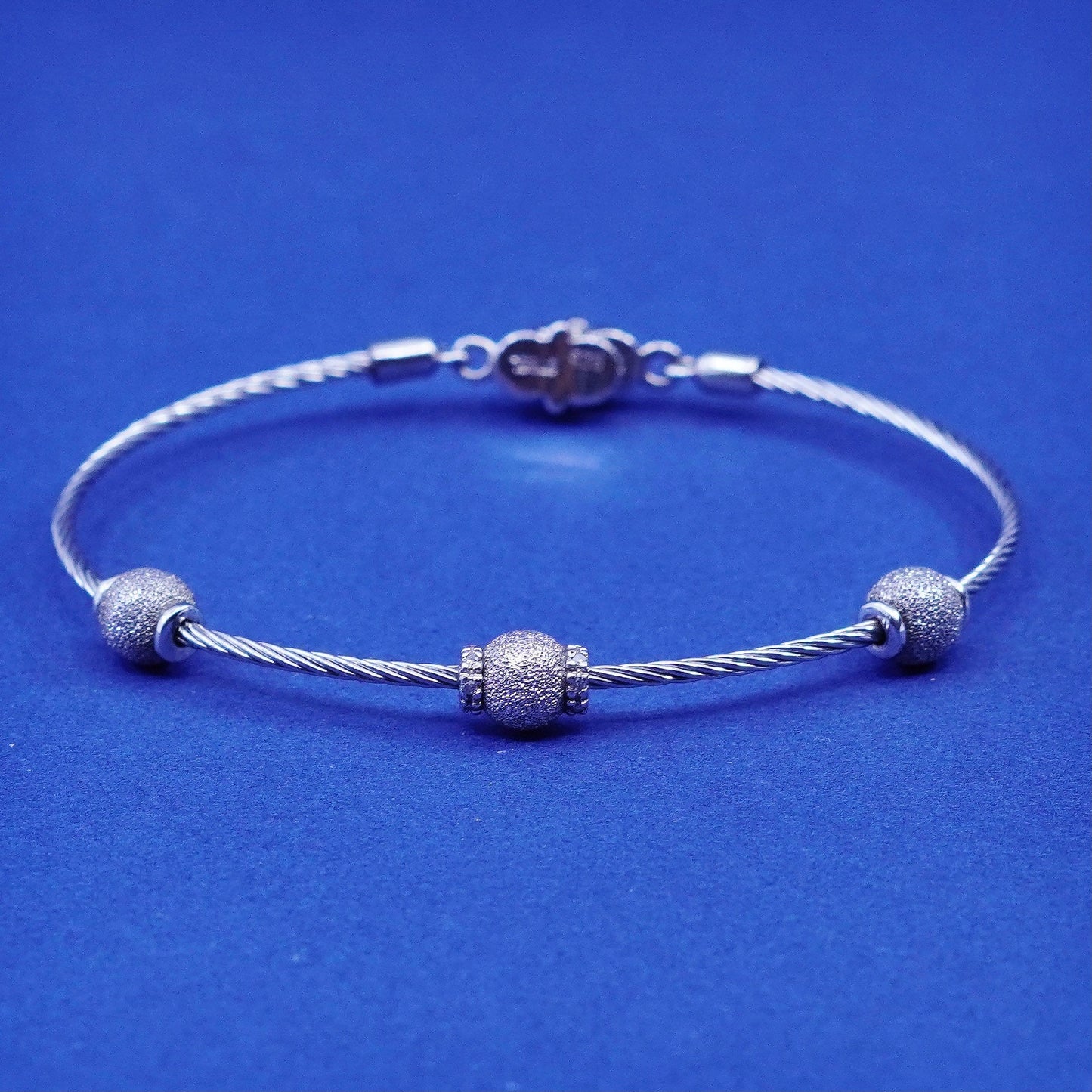 7”, stainless steel cable bracelet with Sterling 925 silver glittering beads