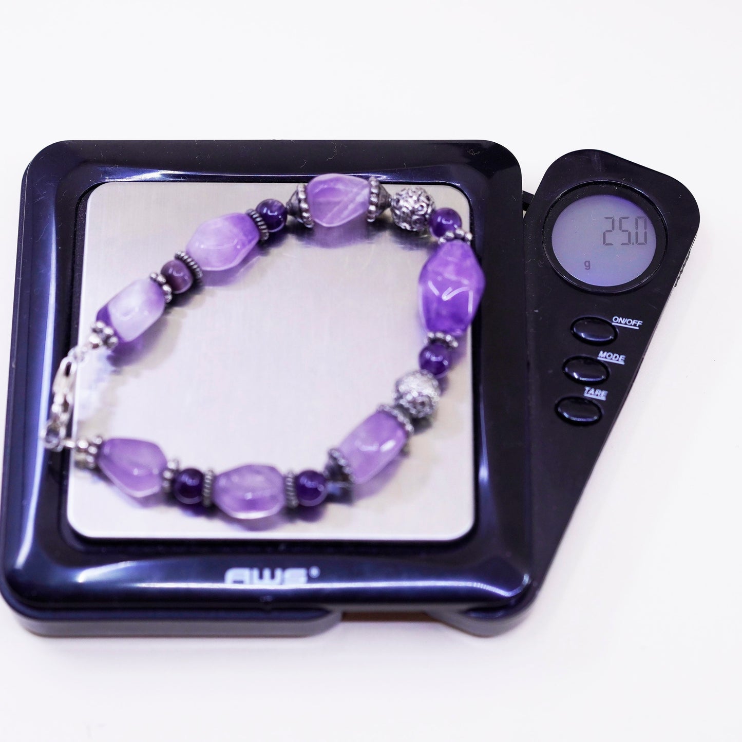 7.25” Sterling silver handmade bracelet, amethyst nuggets tiger eye beads