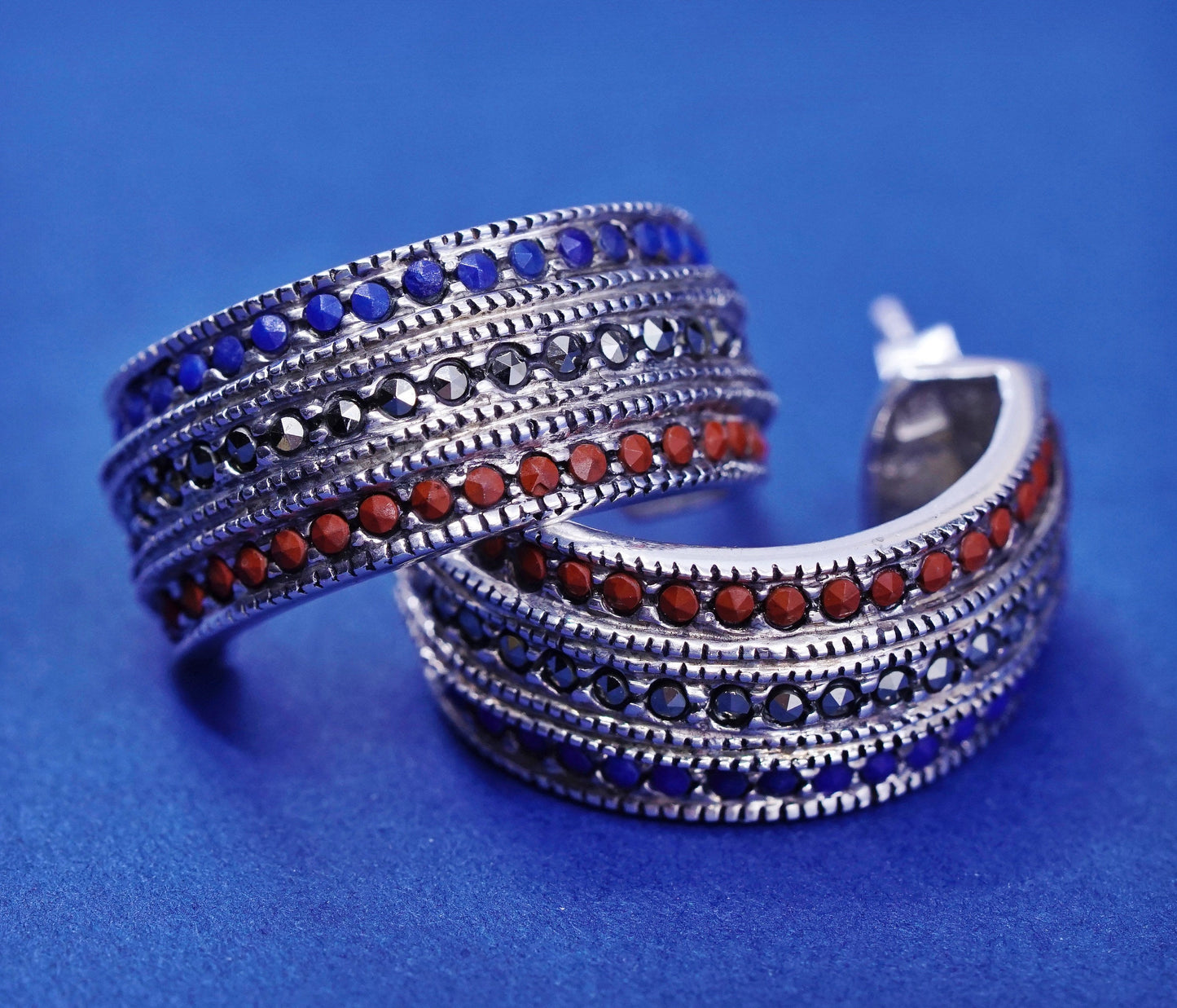 0.75”, Sterling silver earrings, 925 Huggie hoops w/ marcasite ruby Sapphire