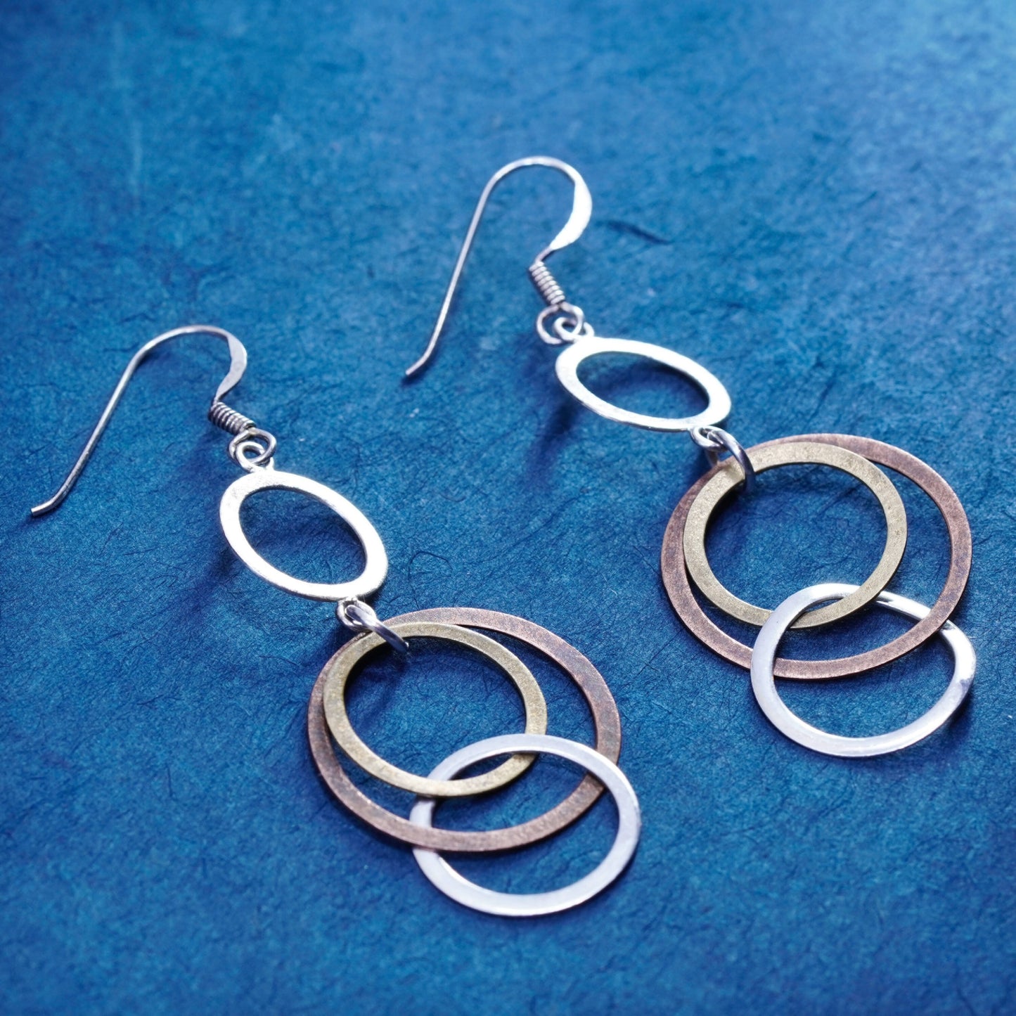 Vintage Sterling Silver handmade Earrings. 925 entwined flatten circle dangles
