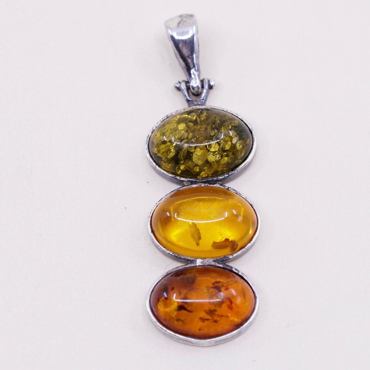 Vintage sterling 925 silver handmade pendant with oval amber