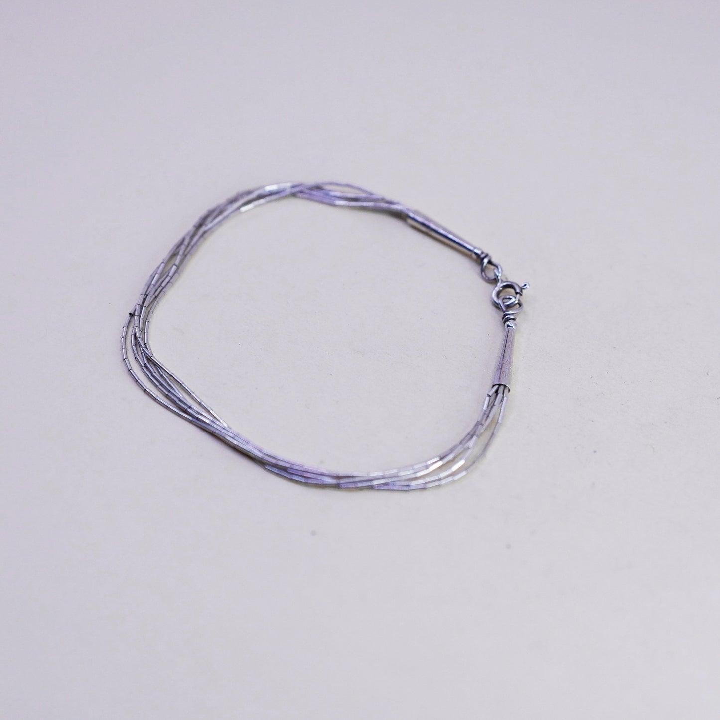 7.5”, Vintage Native American sterling 925 liquid silver multi strands bracelet