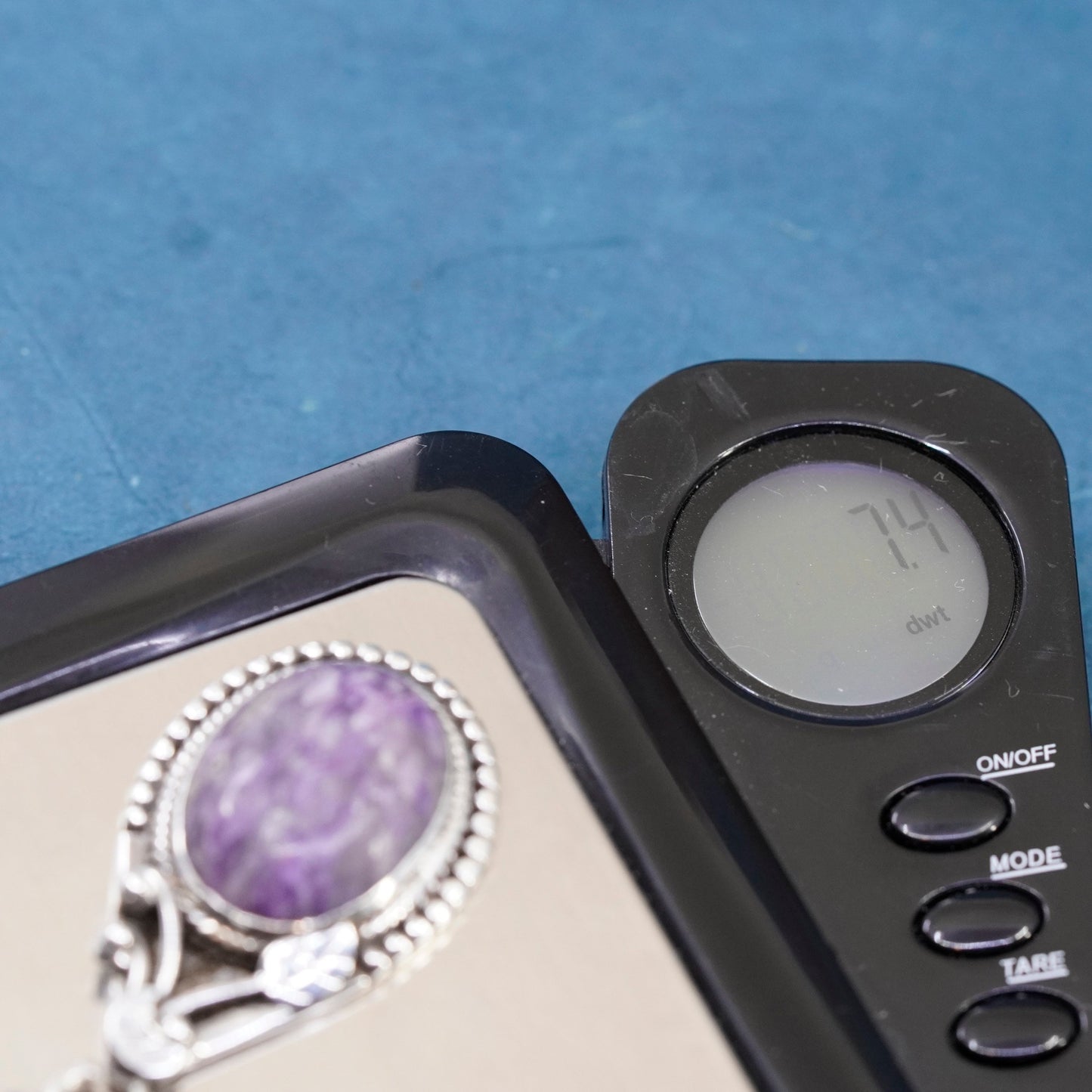 Vintage sterling 925 silver handmade pendant with oval amethyst and leaves