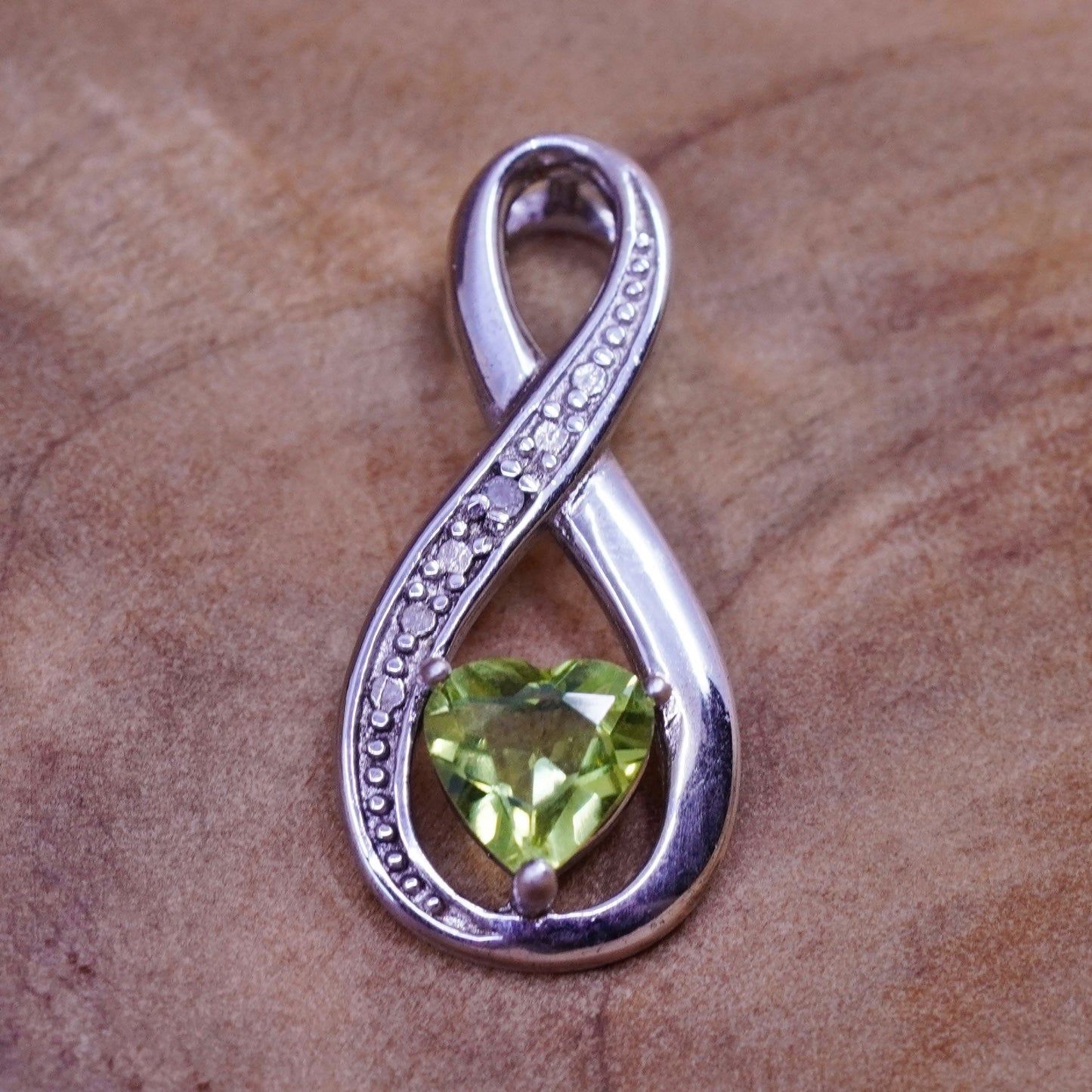 Vintage sterling silver pendant, 925 twisted loop with genuine diamond peridot