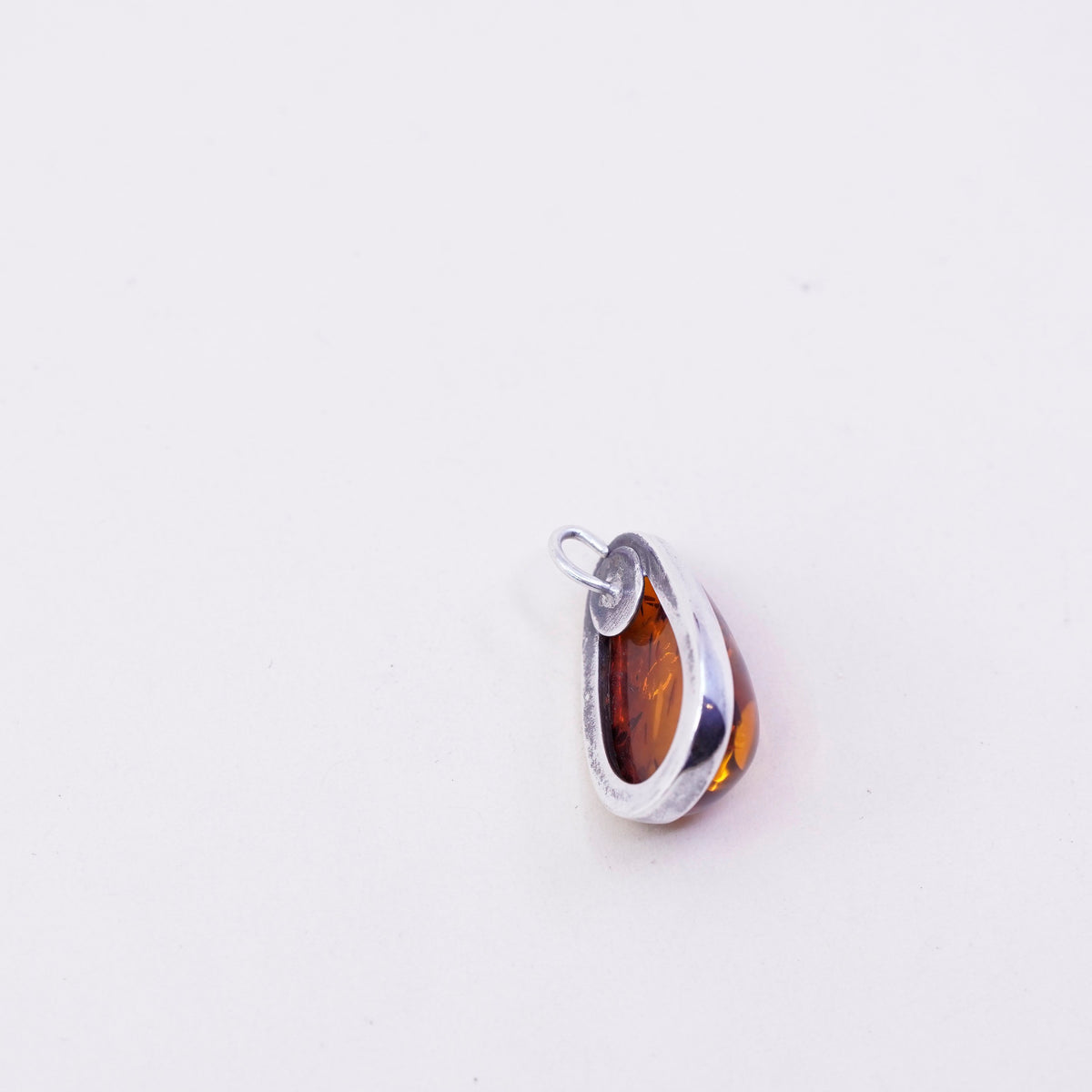 Vintage sterling 925 silver handmade pendant with teardrop amber