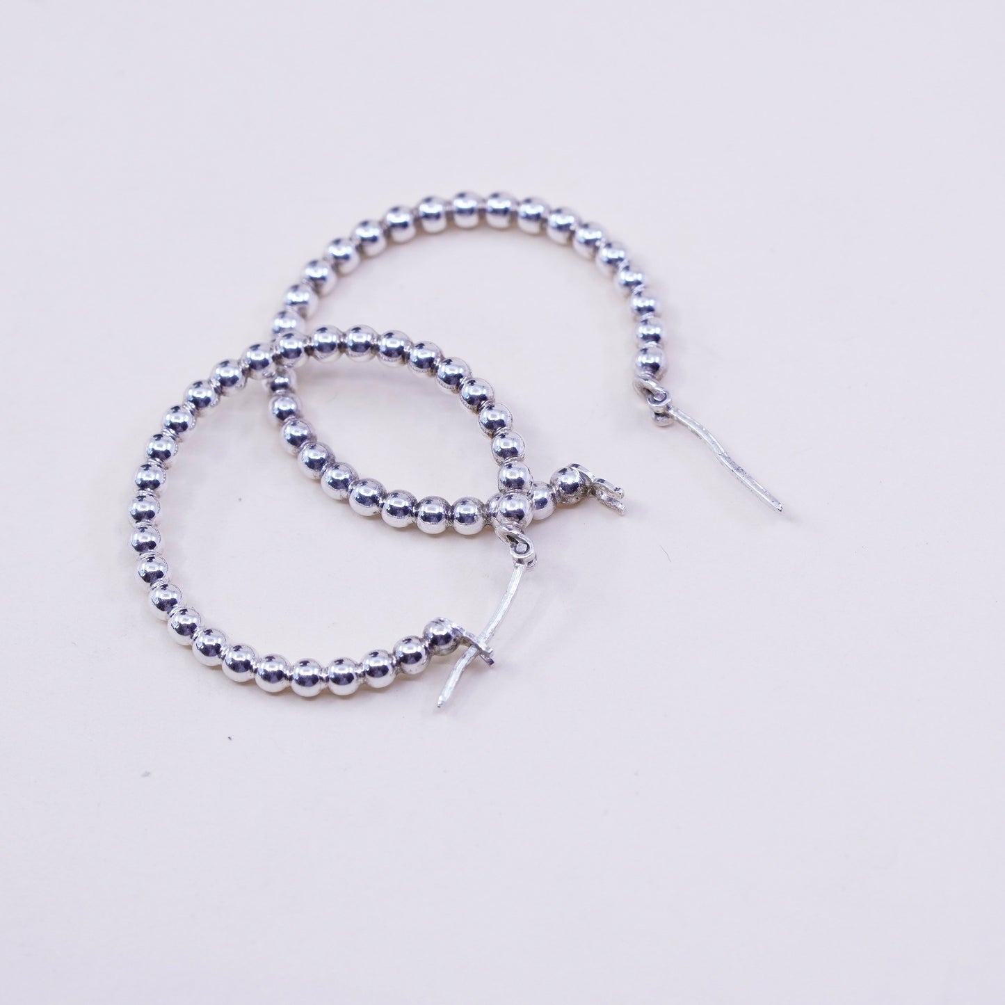 1.25”, vtg sterling 925 silver loop earrings, minimalist primitive bead hoops