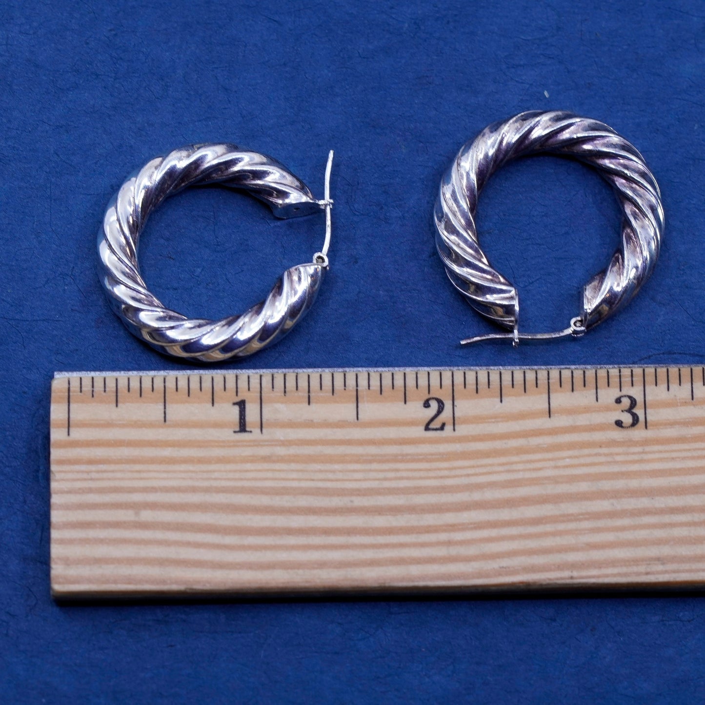 1.25”, vtg Sterling silver handmade earrings, bold 925 entwined hoops, huggie