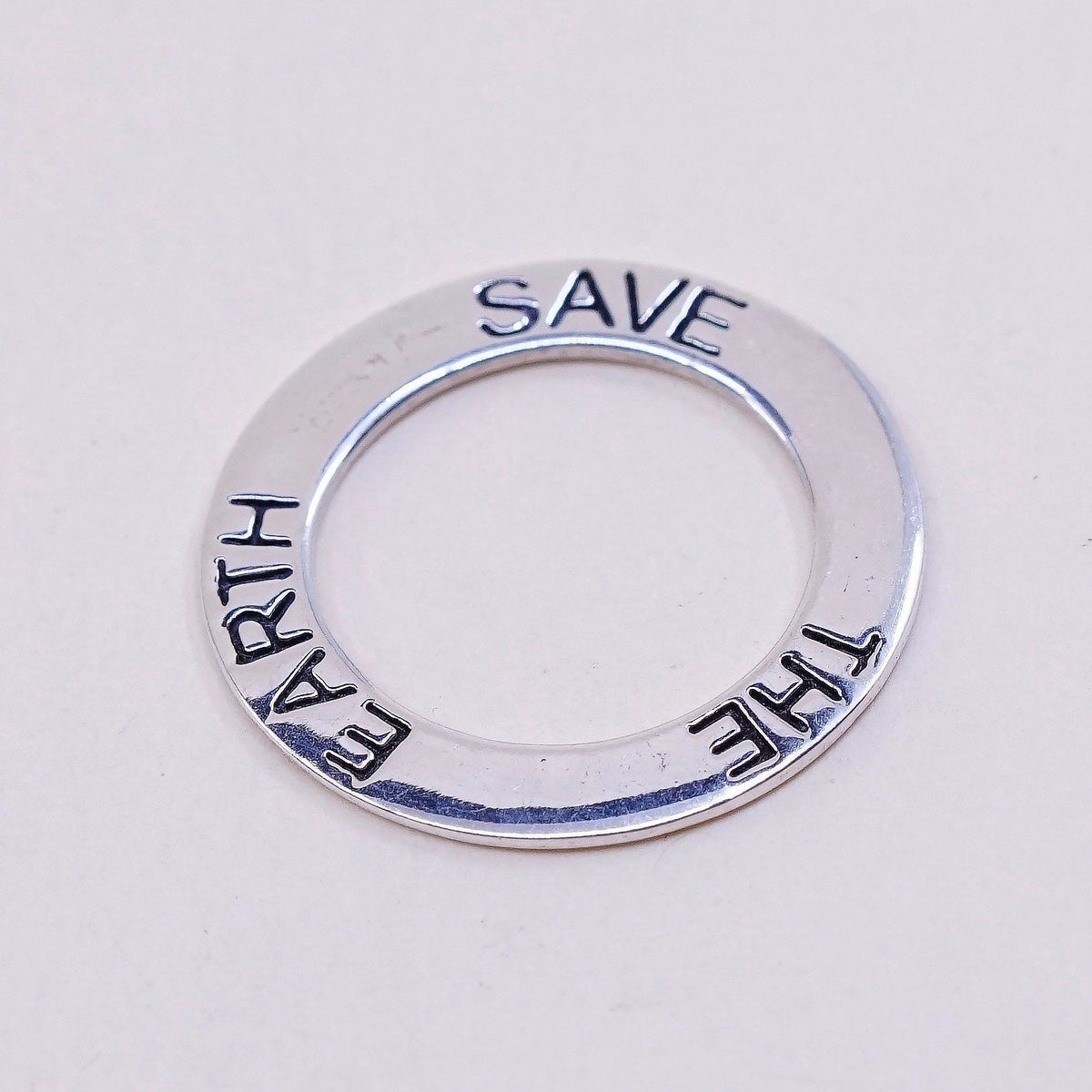 Vintage sterling silver handmade pendant, 925 circle embossed ”save the earth”