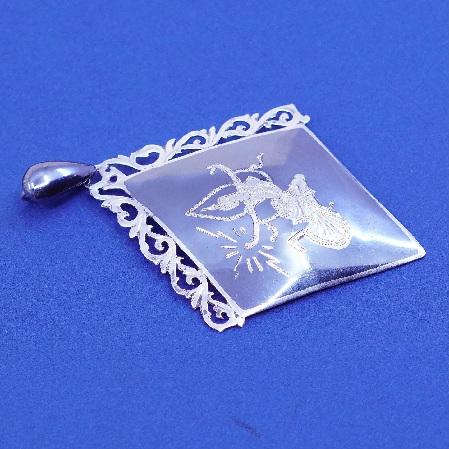 vtg Sterling 925 silver handmade diamond shaped pendant with goddess pattern