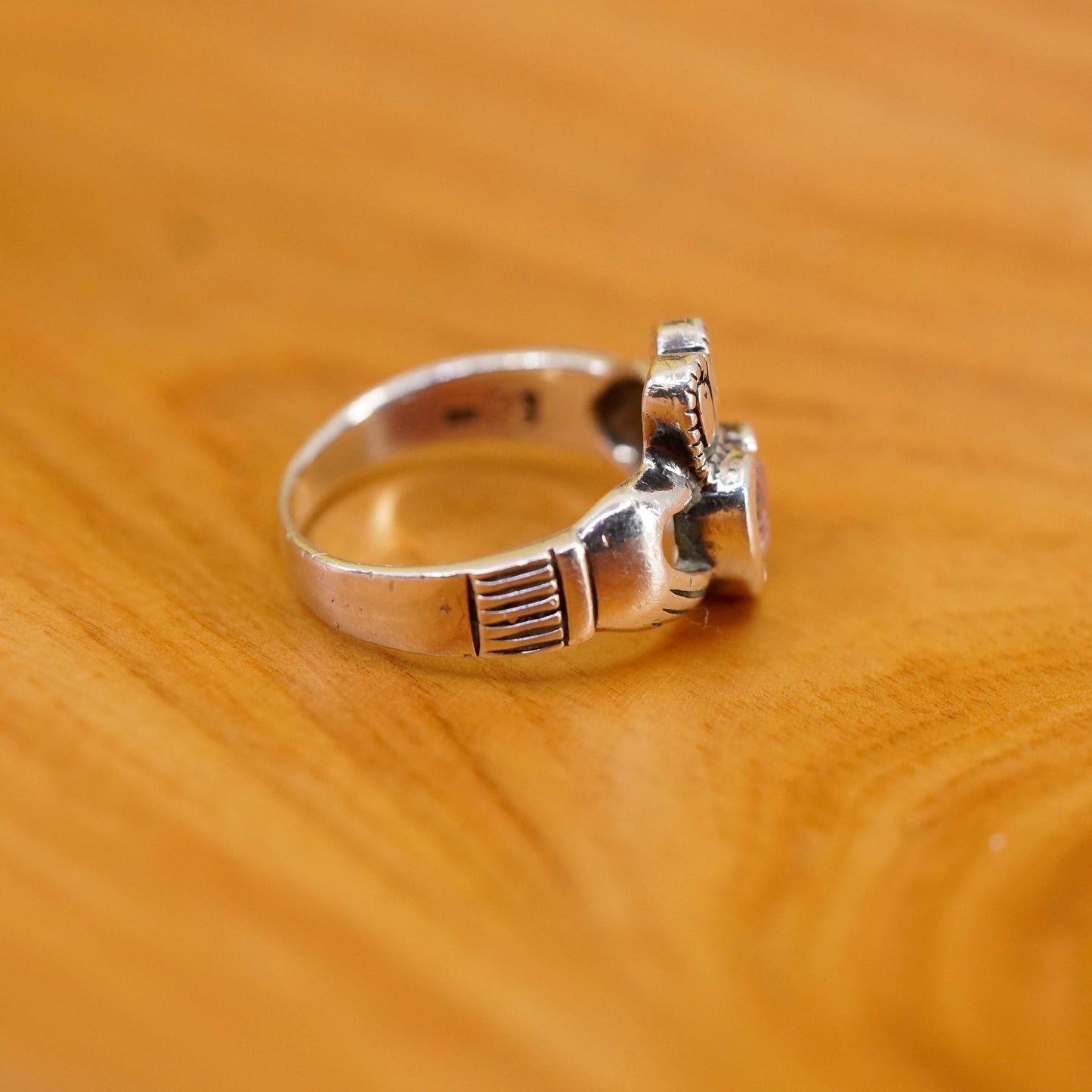 Size 7, Vintage sterling 925 silver claddagh ring, holding pink Cz heart band