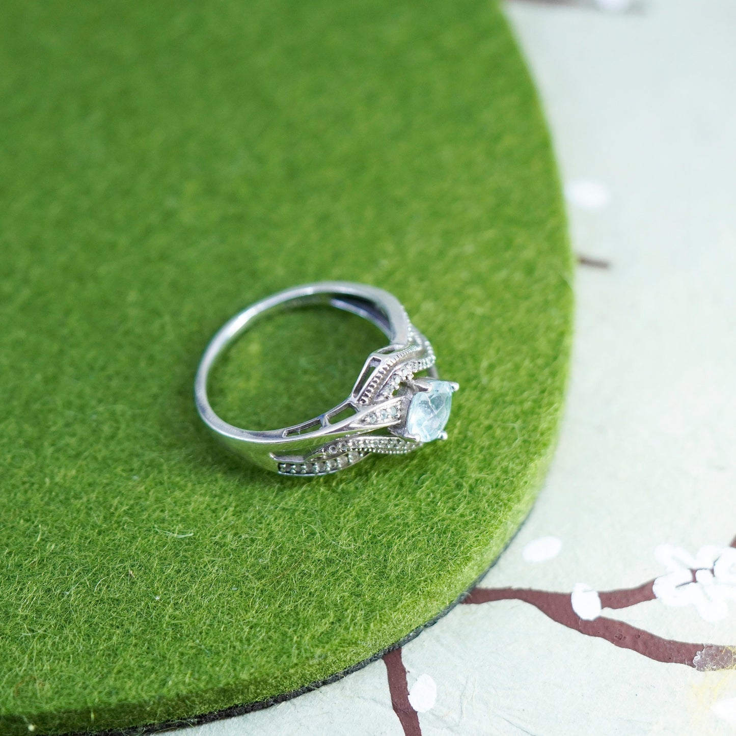 Size 10, sterling 925 silver handmade ring with blue topaz and cluster diamonds