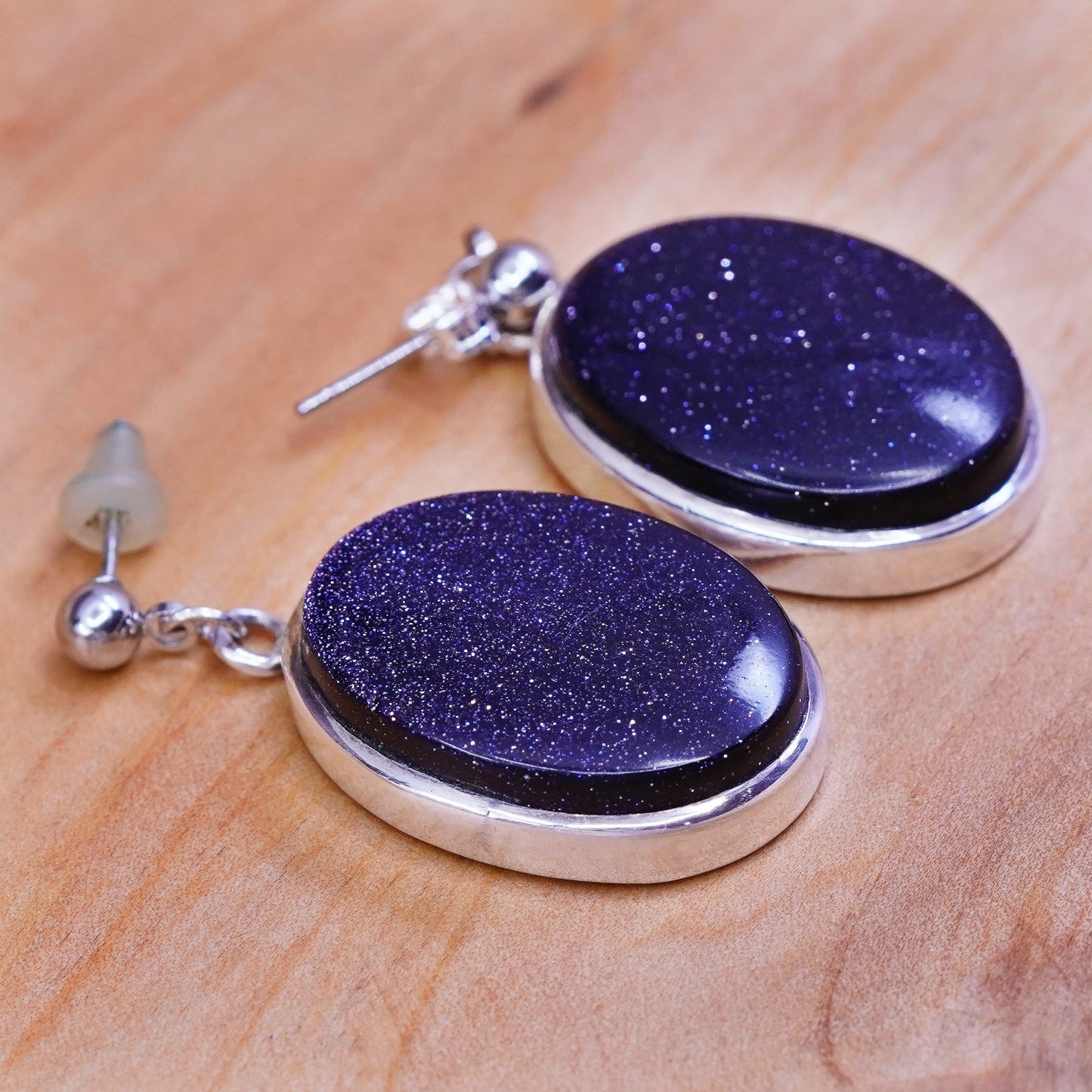 Vintage sterling 925 silver handmade earrings with oval blue goldstone dangle