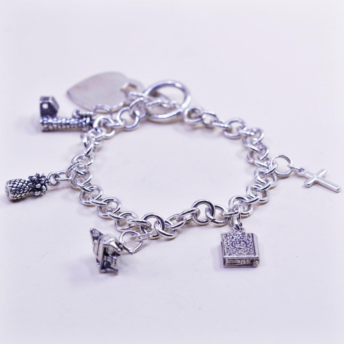 6.75” sterling silver bracelet, bold circle chain heart bible cross piano