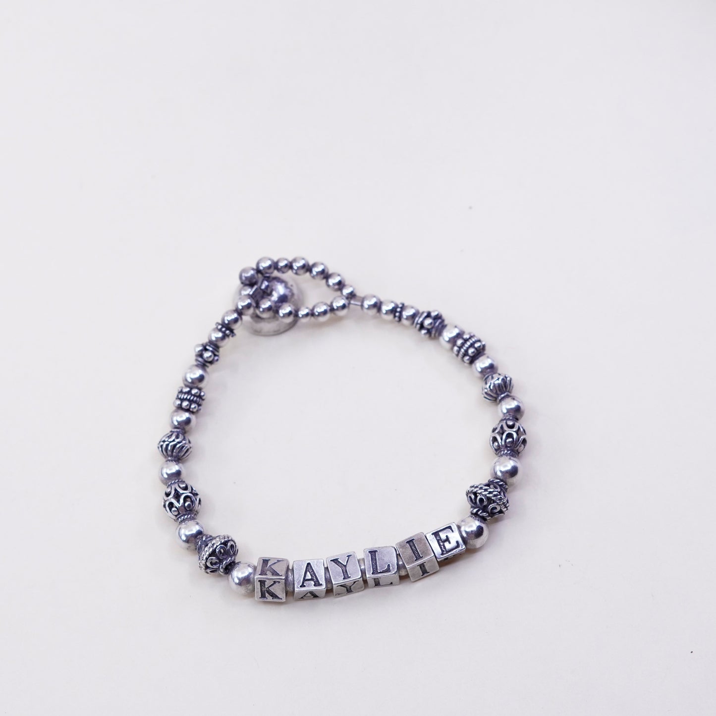 6.75”, Sterling 925 Silver filigree beads bracelet with name “Kaylie” cubes