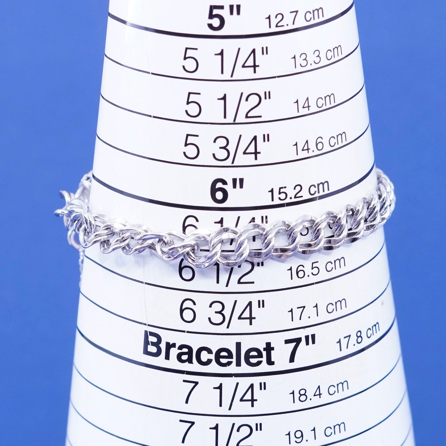 6.25”, Sterling silver bracelet, 925 double curb chain w/ Canada maple charm