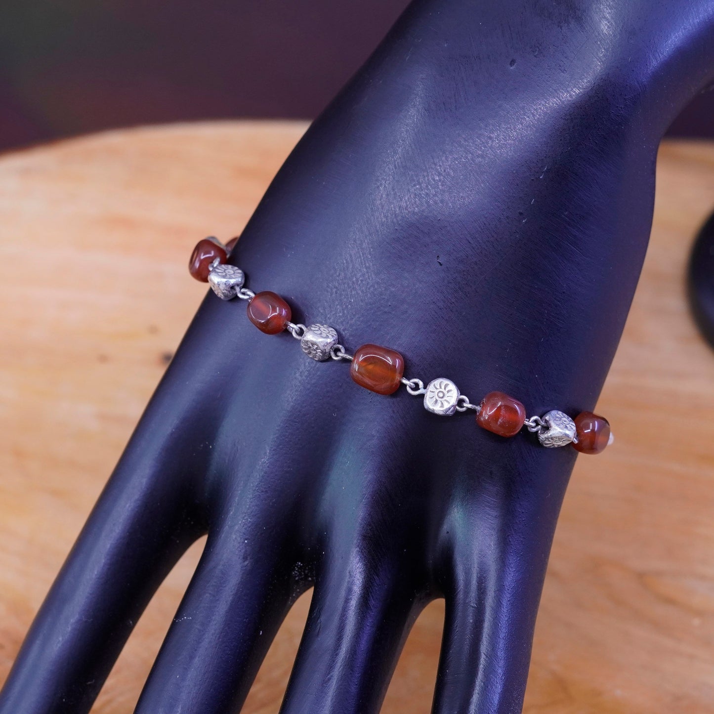 7.75”, vtg Sterling silver handmade garnet beads bracelet with toggle closure