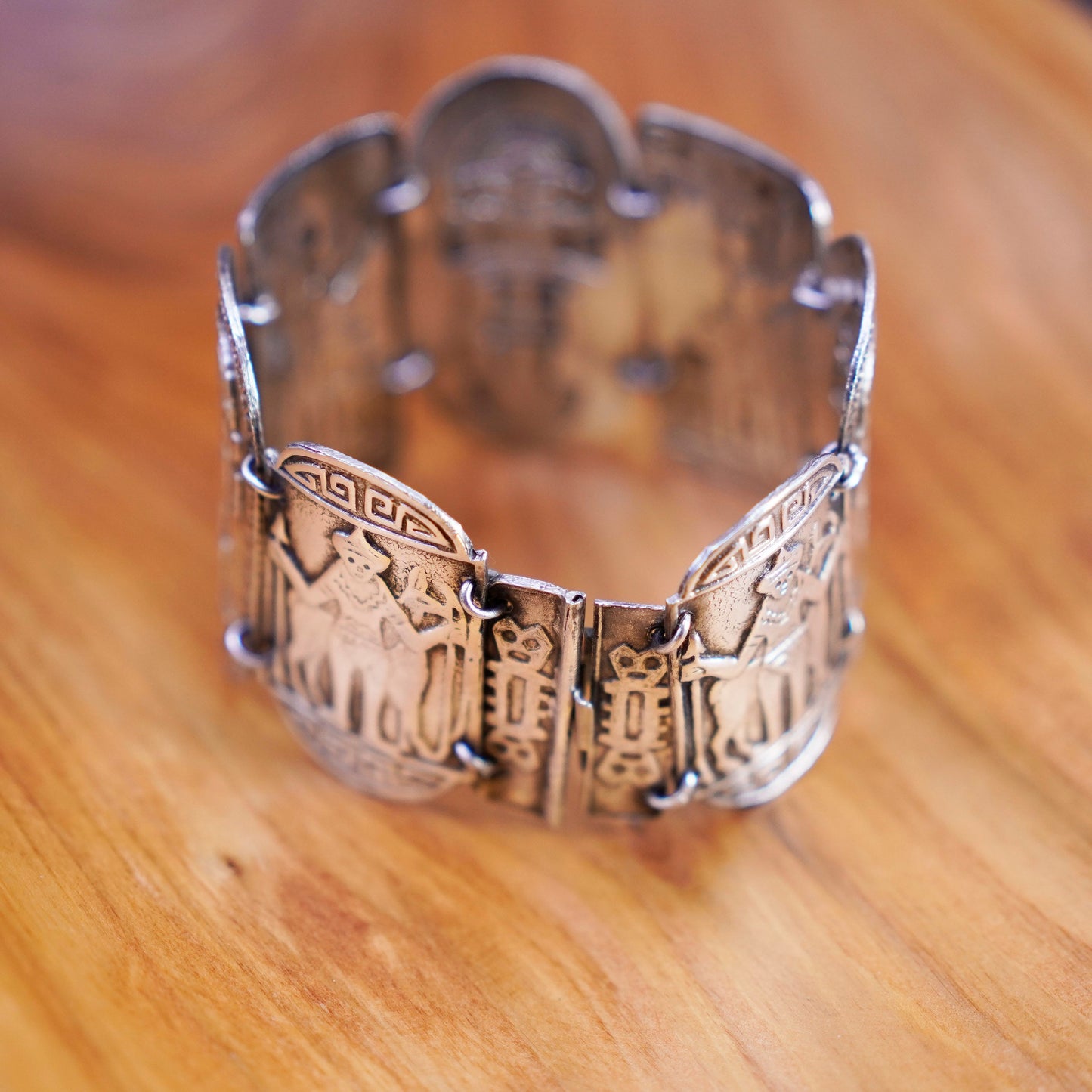 6.25”, Sterling 900 silver Peru Inca gods hinged storyteller bangle bracelet